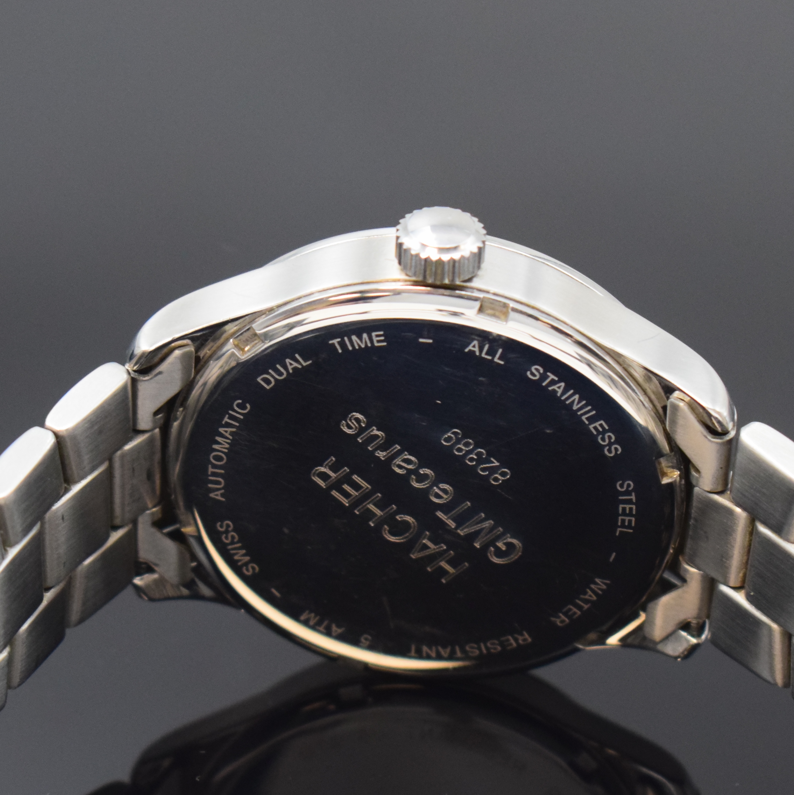 Detail c: HACHER Dual Time Herrenarmbanduhr in Stahl/ Stahlband, Schweiz um 2020, Automatik, satiniertes Geh. u. Band, Boden verschr., schwarz. Zifferbl. m. ...