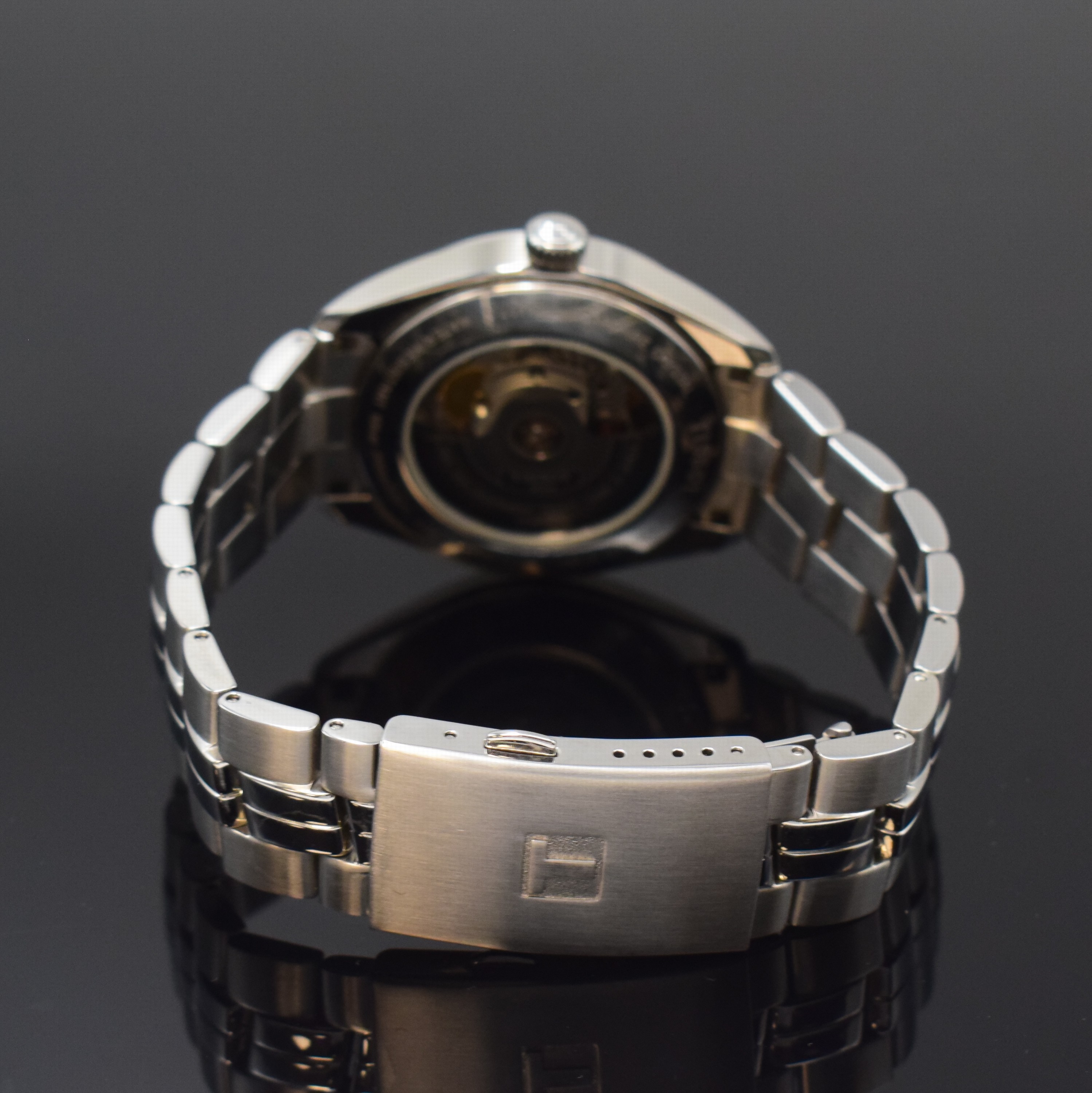 Detail b: TISSOT PR100 Powermatic 80 Herrenarmbanduhr in Stahl/Stahlband, Schweiz um 2020, Automatik, beids. vergl. Geh., Boden u. Glasrand aufgedr., weisses ...