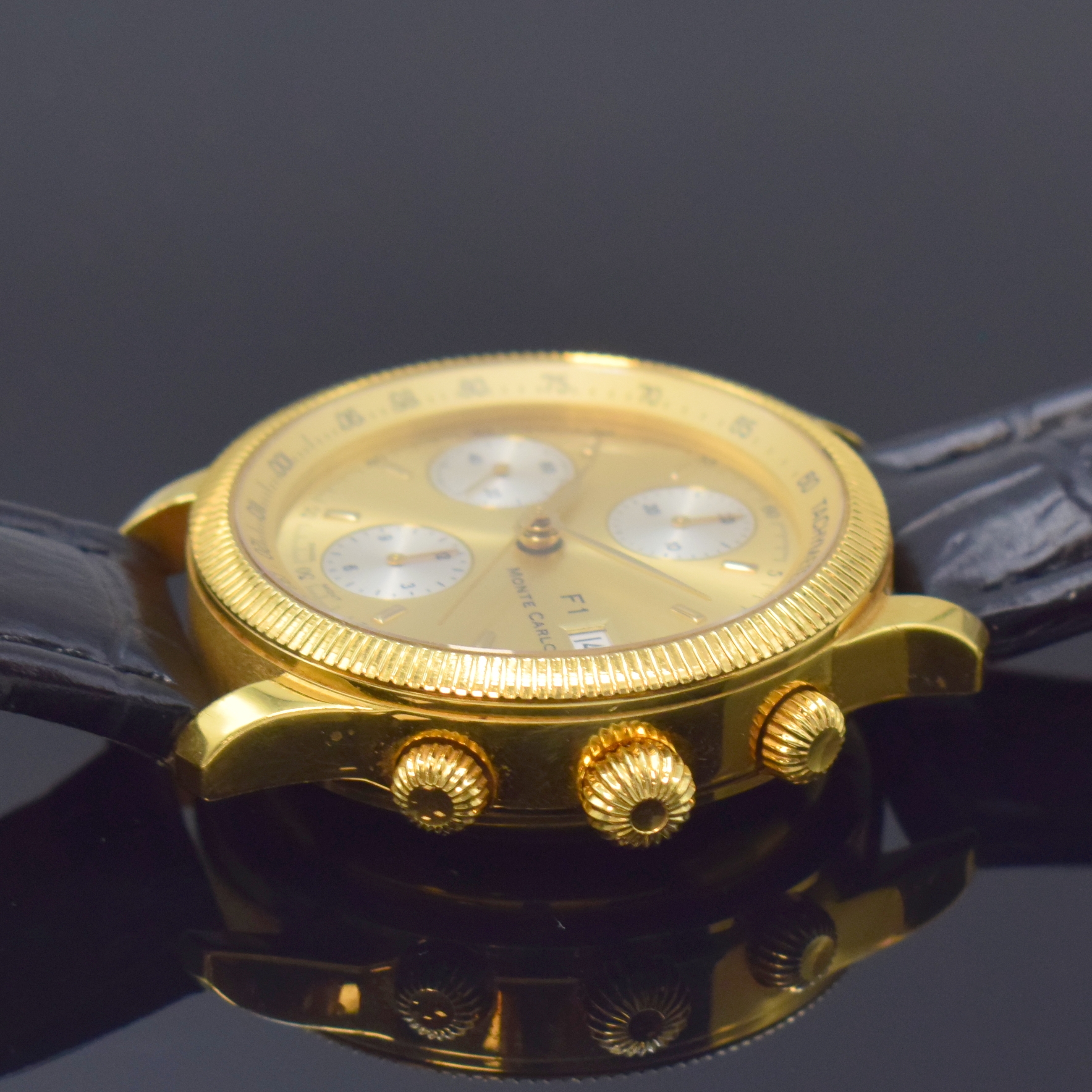 Detail b: F 1 Monte Carlo schwerer Armbandchronograph in GG 750/000, Schweiz um 1995, Automatik, beids. vergl. Geh., Boden 8-fach verschr., gold. Zifferbl., ...