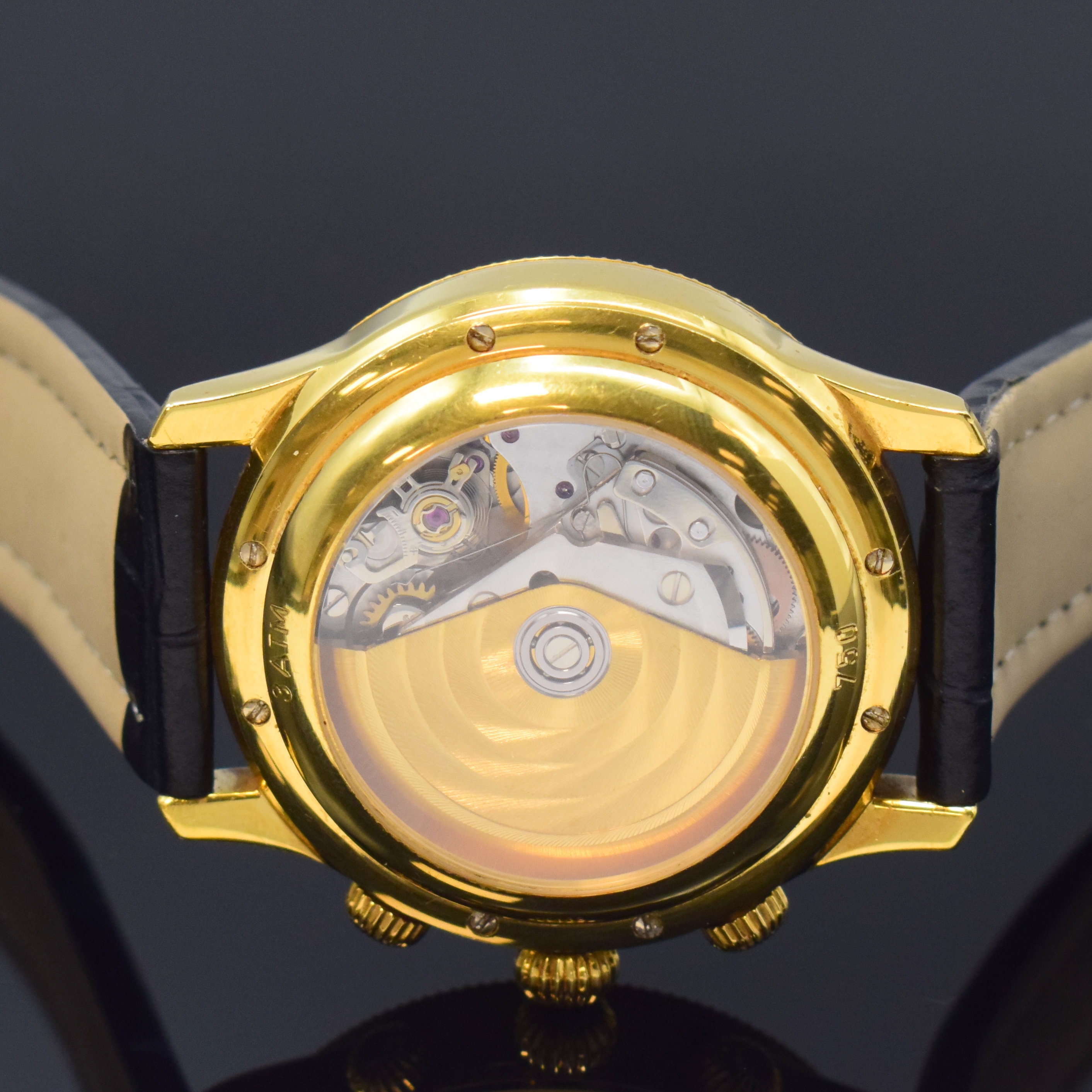 Detail d: F 1 Monte Carlo schwerer Armbandchronograph in GG 750/000, Schweiz um 1995, Automatik, beids. vergl. Geh., Boden 8-fach verschr., gold. Zifferbl., ...