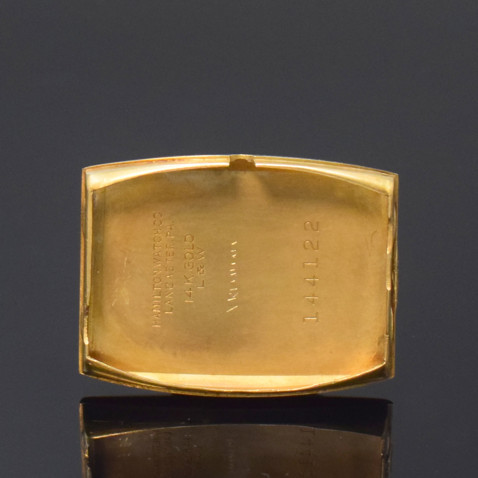 Detail e: HAMILTON rechteckige Armbanduhr in GG 585/000, USA um 1940, Handaufzug, 2-tlg. Geh. m. ausgefallenen Bandanstössen, Boden aufgedr., silb. Zifferbl. ...