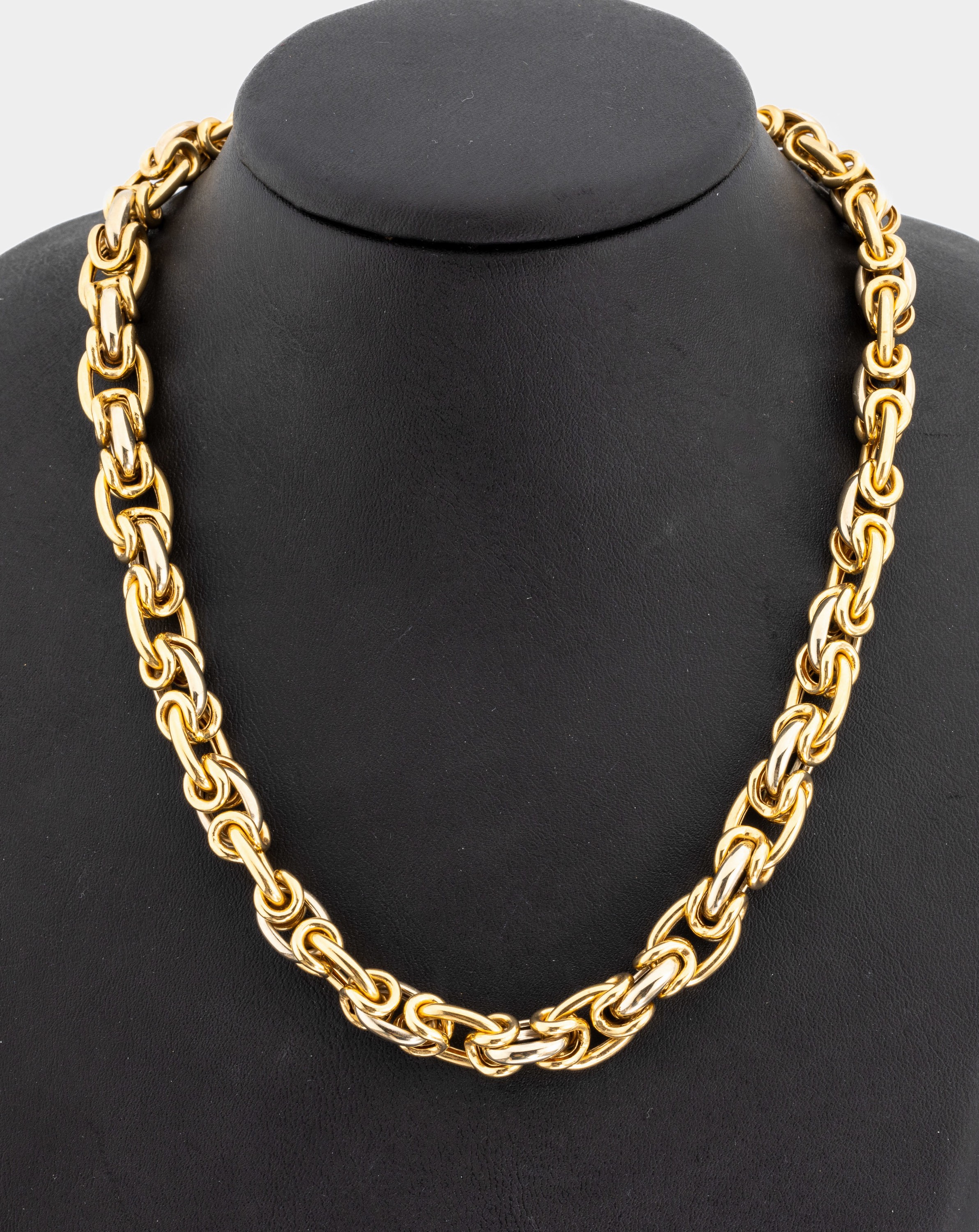 18 kt Gold Collier, GG/WG 750/000, ausgefallene Königskettenoptik, L. ca. 44 cm, gr. Federringschließe, ca. 56.4 g