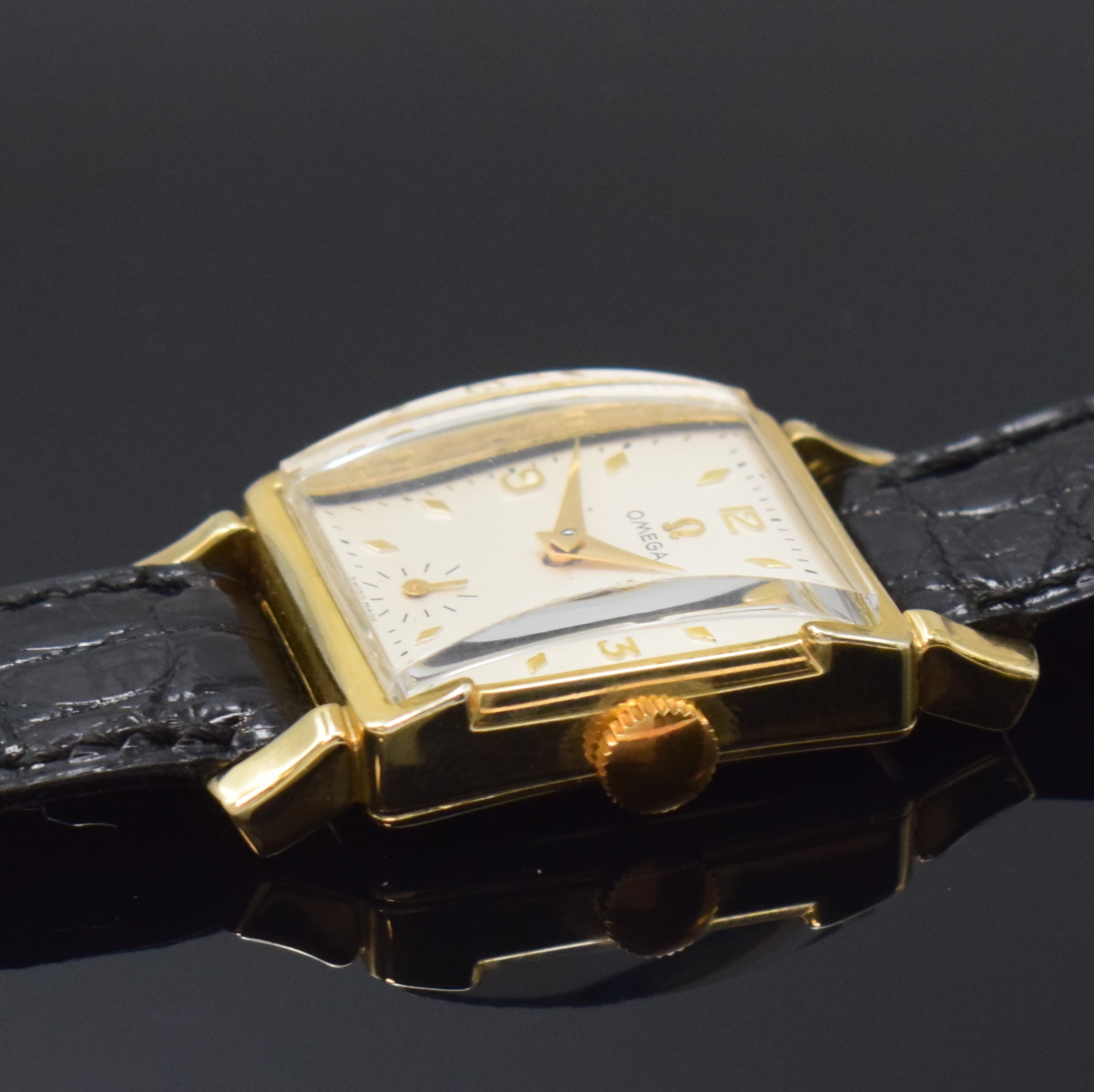 Detail c: OMEGA rechteckige Armbanduhr in 14k Gold- Filled, Schweiz / USA um 1951, Handaufzug, 2-tlg. Geh., Boden aufgedr., silb. Zifferbl. rest., gold. ...