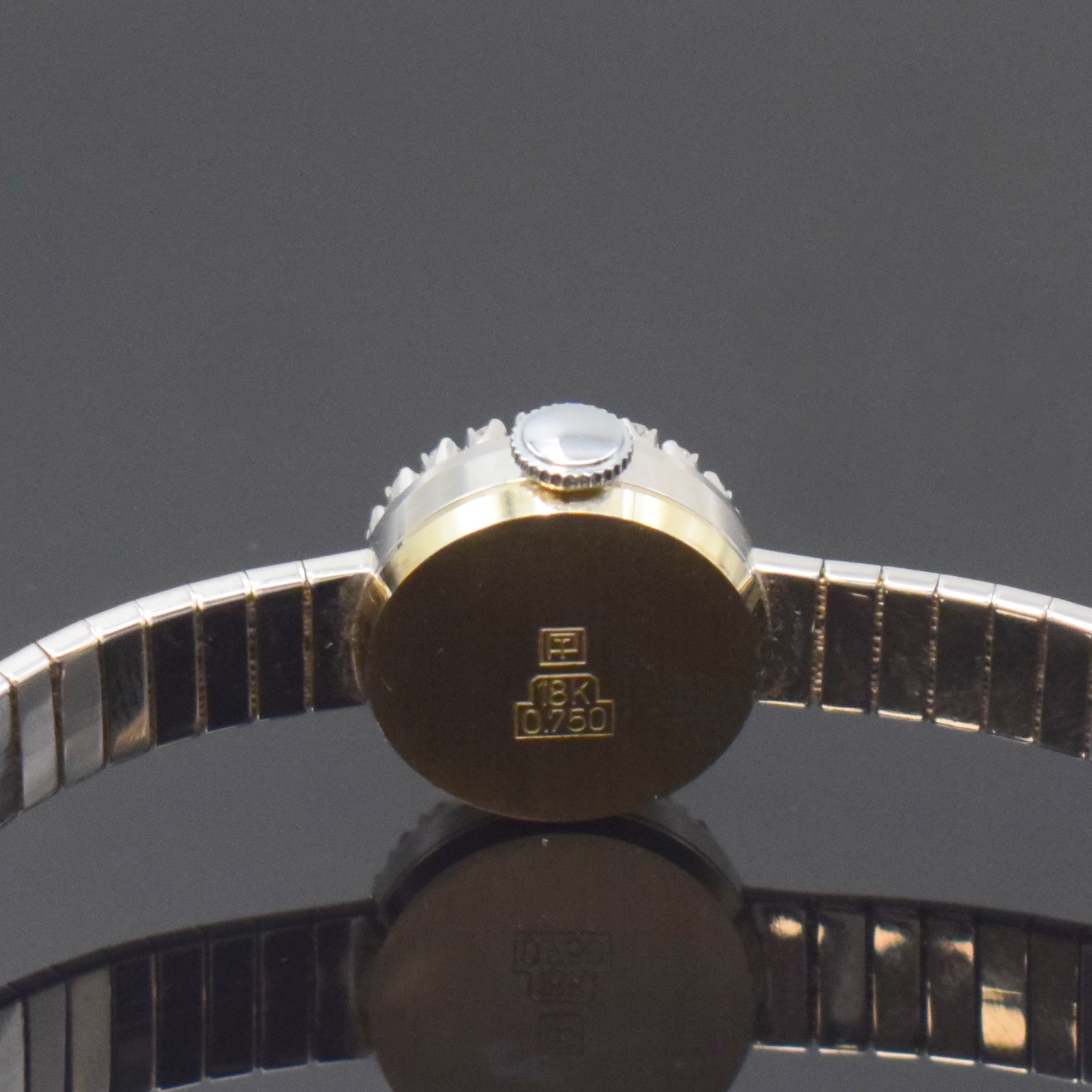 Detail c: RHODOS Diamant-besetzte Damenarmbanduhr in WG 750/000, Schweiz um 1960, Handaufzug, 2-tlg. Geh., Boden aufgedr., anges., teils pol./teils satiniertes ...