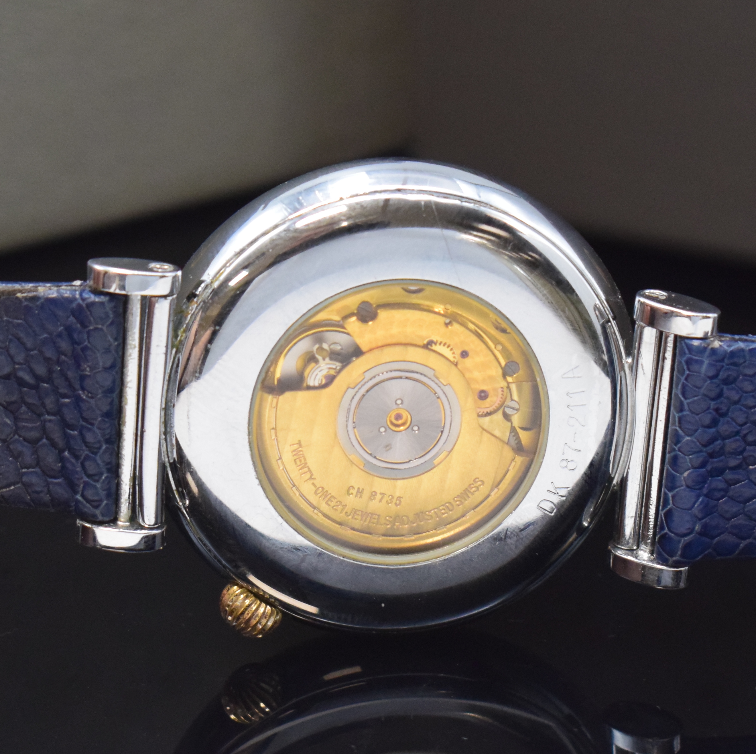 Detail d: CHRONOSWISS Armbanduhr mit 5-Minuten- Repetition Referenz DK87-211A, Schweiz um 1995, Automatik, verchr., beids. vergl. Geh., Repetitions-Drücker b. ...