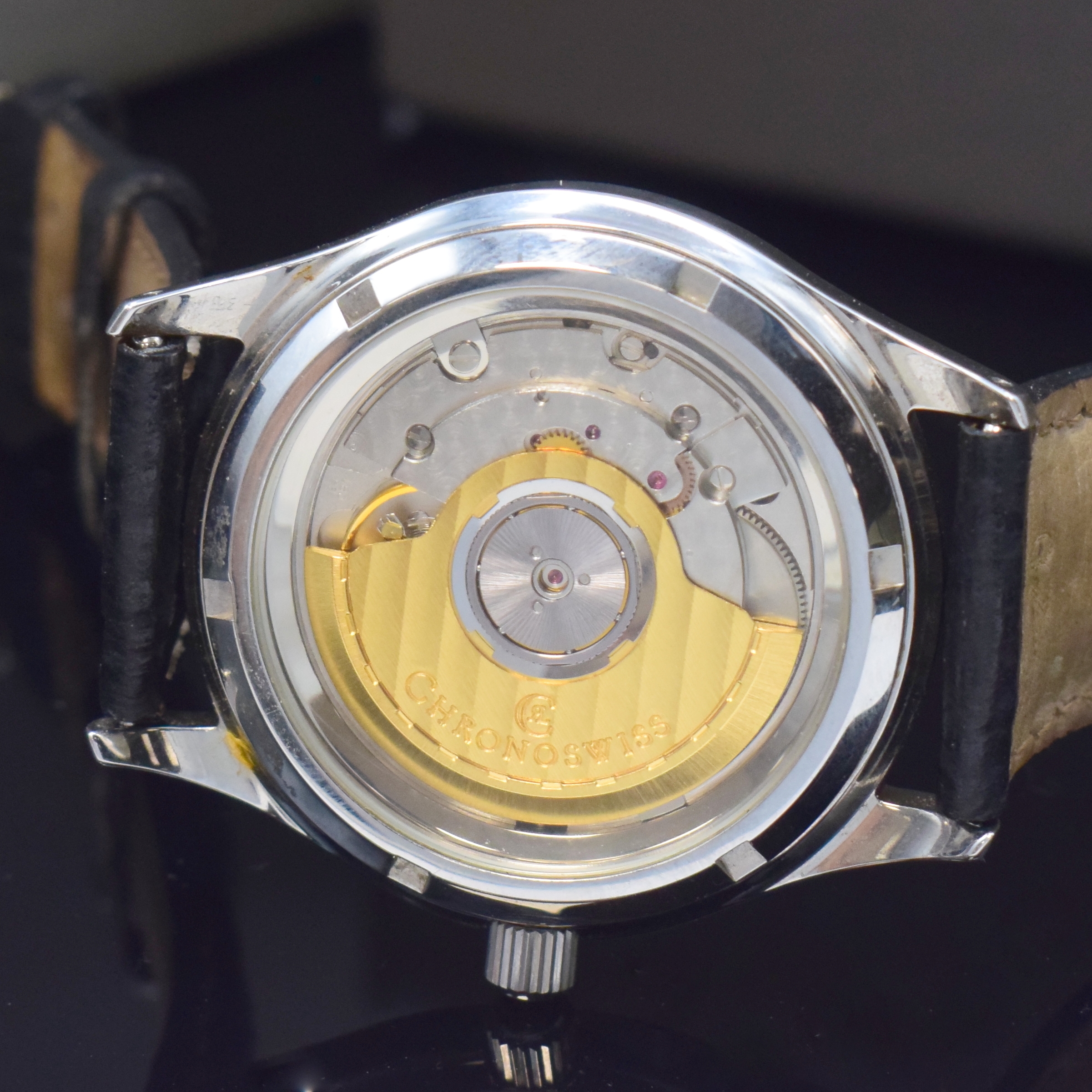 Detail d: CHRONOSWISS Pacific Armbanduhr in Stahl Referenz CH2813SW, Schweiz um 1995, Automatik, beids. vergl. Geh., Boden u. Krone verschr., graues Zifferbl., ...