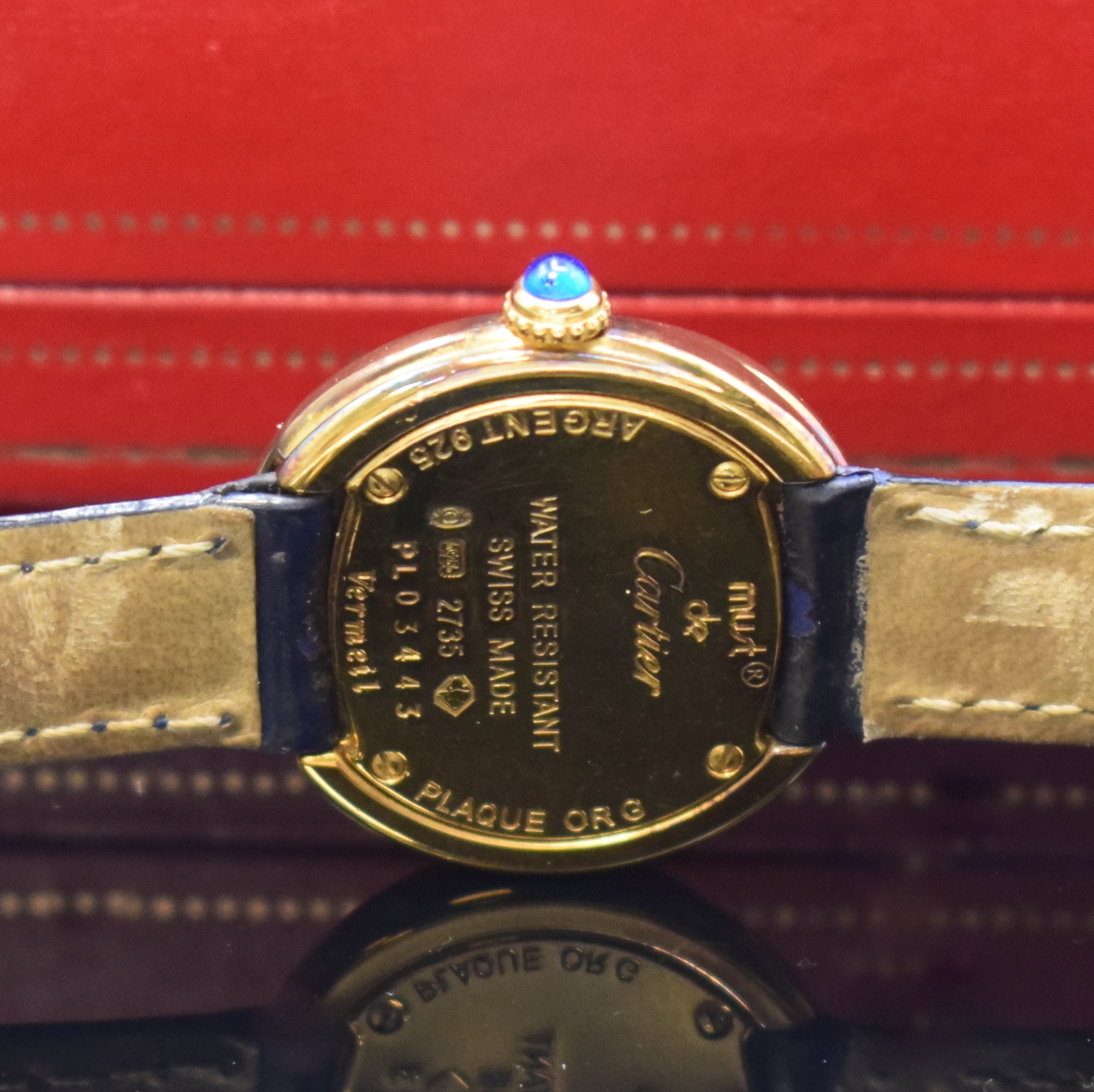 Detail d: CARTIER Damenarmbanduhr Trinity Referenz 2735, Schweiz um 1990, verg. Sterlingsilbergeh. inkl. orig. Lederband m. orig. Faltschl., quarz, Boden ...