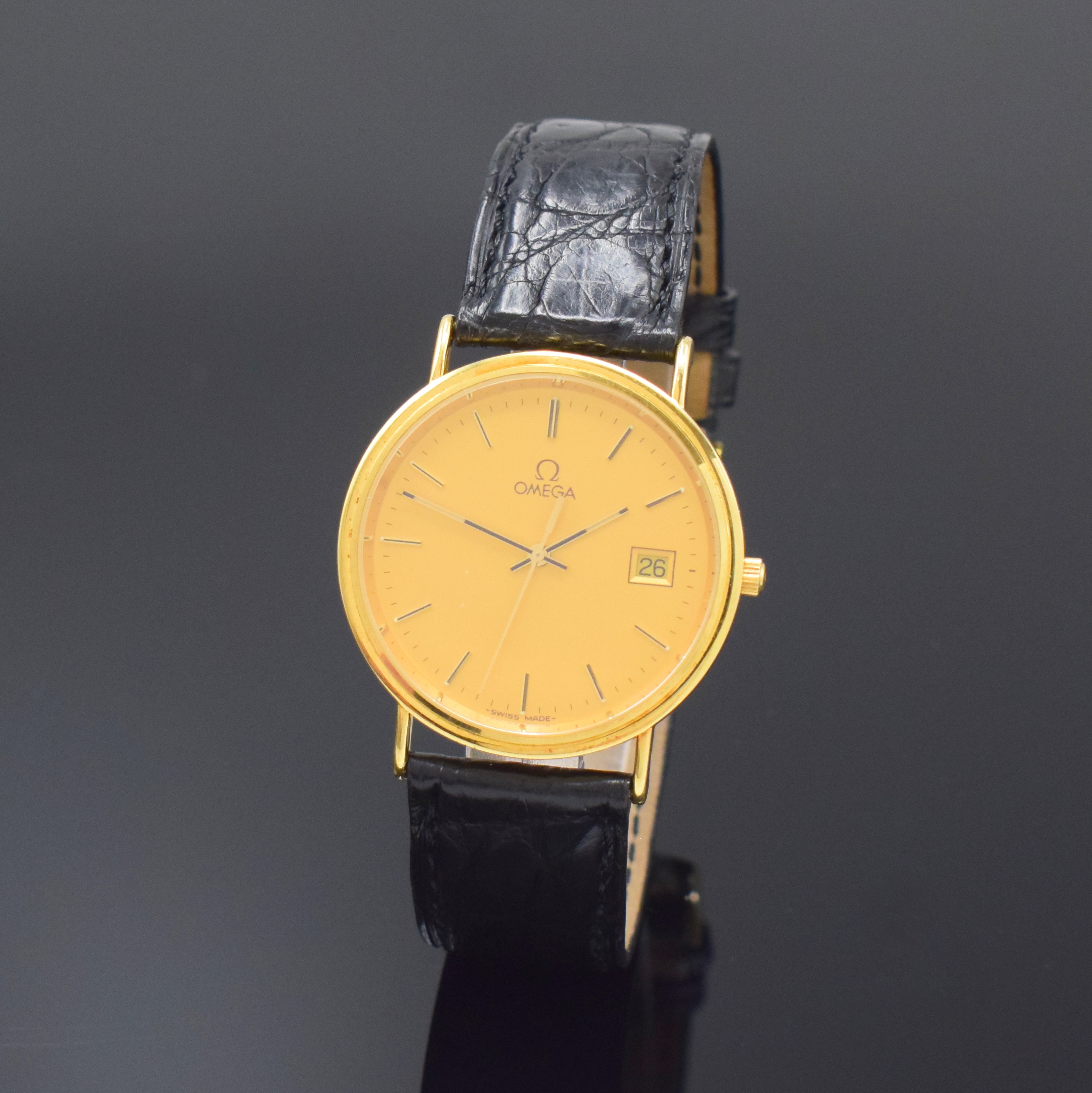 OMEGA Herrenarmbanduhr in GG 750/000 Referenz 1967500, Schweiz um 1990, 2-teil. Geh. inkl. orig. Lederband m. verg. orig. Dornschl., Boden aufgedr., ...