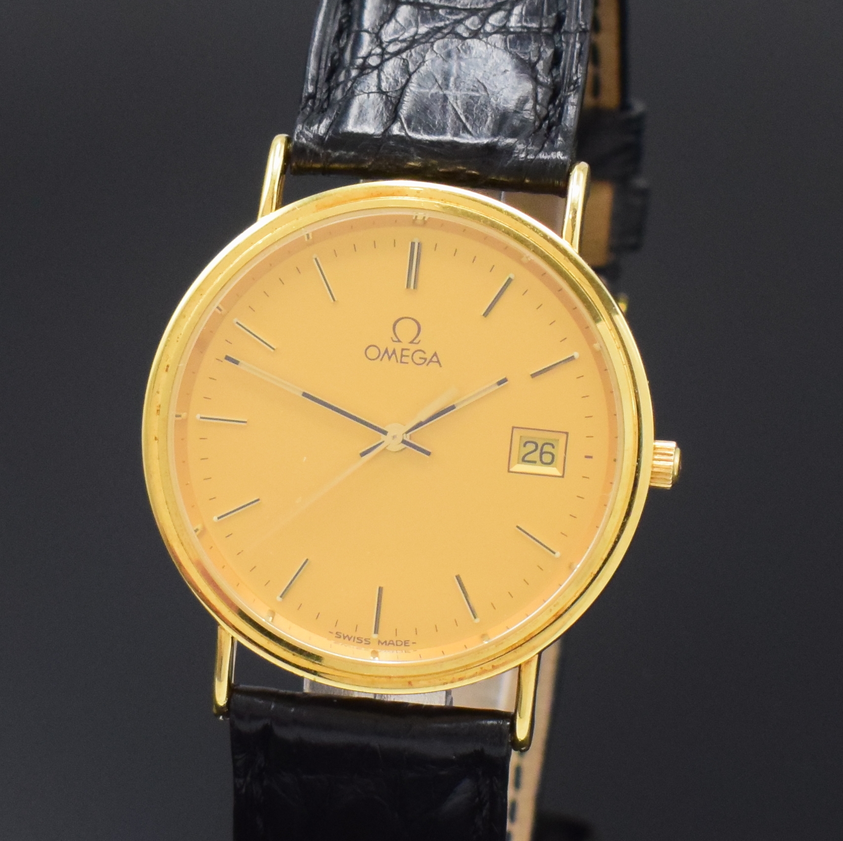 Detail a: OMEGA Herrenarmbanduhr in GG 750/000 Referenz 1967500, Schweiz um 1990, 2-teil. Geh. inkl. orig. Lederband m. verg. orig. Dornschl., Boden aufgedr., ...