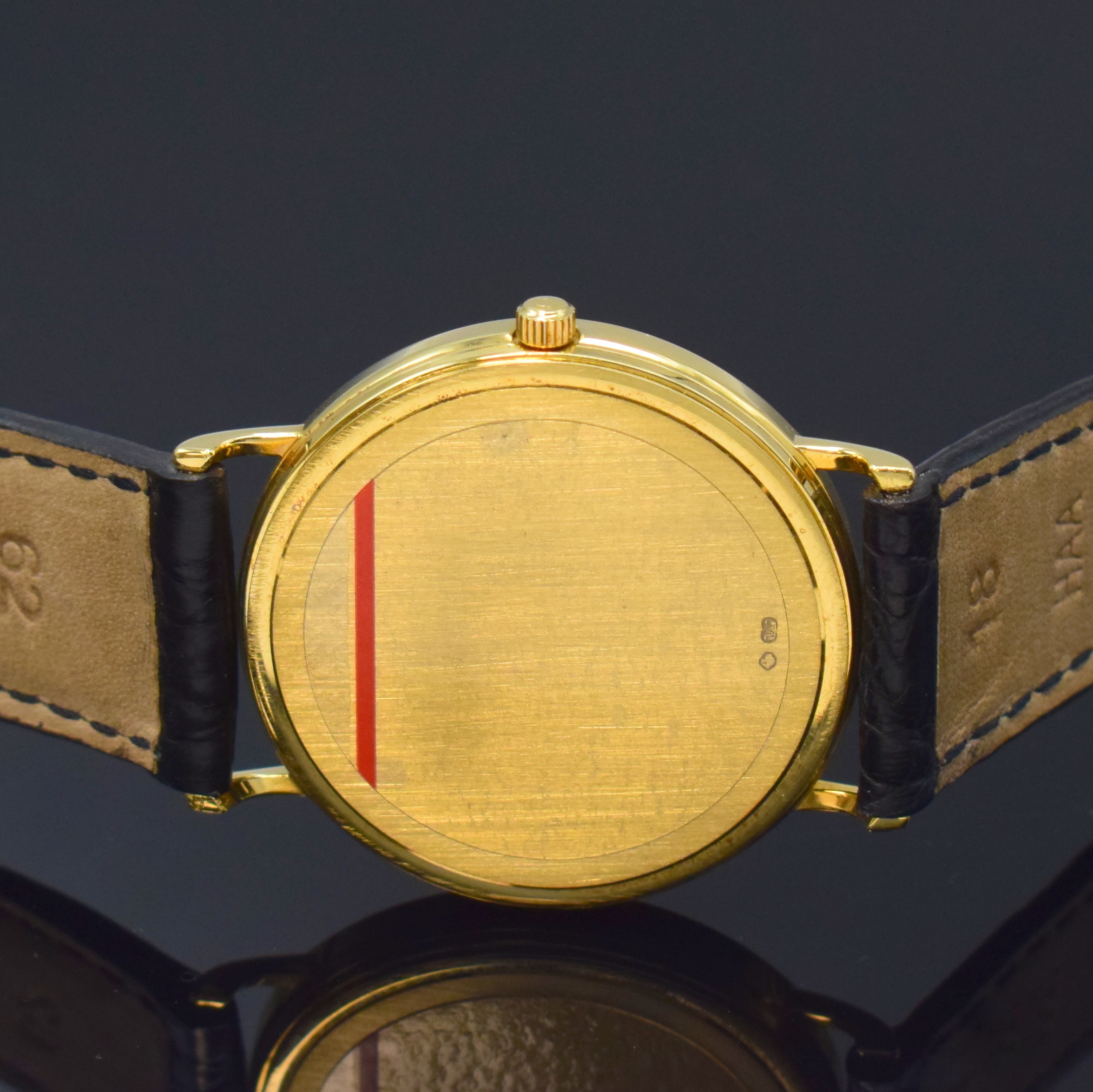 Detail c: OMEGA Herrenarmbanduhr in GG 750/000 Referenz 1967500, Schweiz um 1990, 2-teil. Geh. inkl. orig. Lederband m. verg. orig. Dornschl., Boden aufgedr., ...