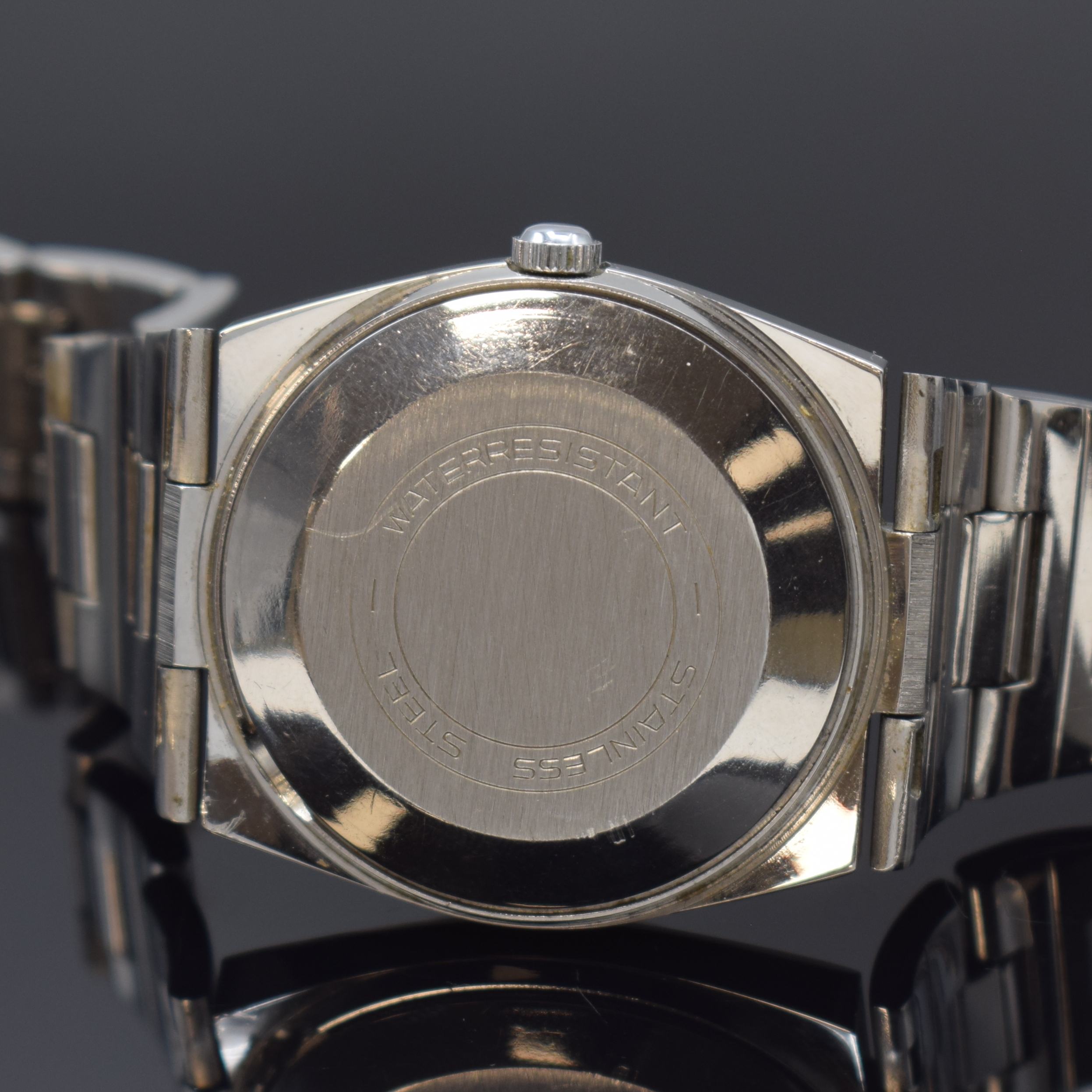 Detail c: MERCEDES BENZ Fahrer Information Armbanduhr,Deutschland um 1975, Automatik, Edelstahlgeh. inkl. integr. Gliederband m. Faltschl., Boden aufgedr., ...