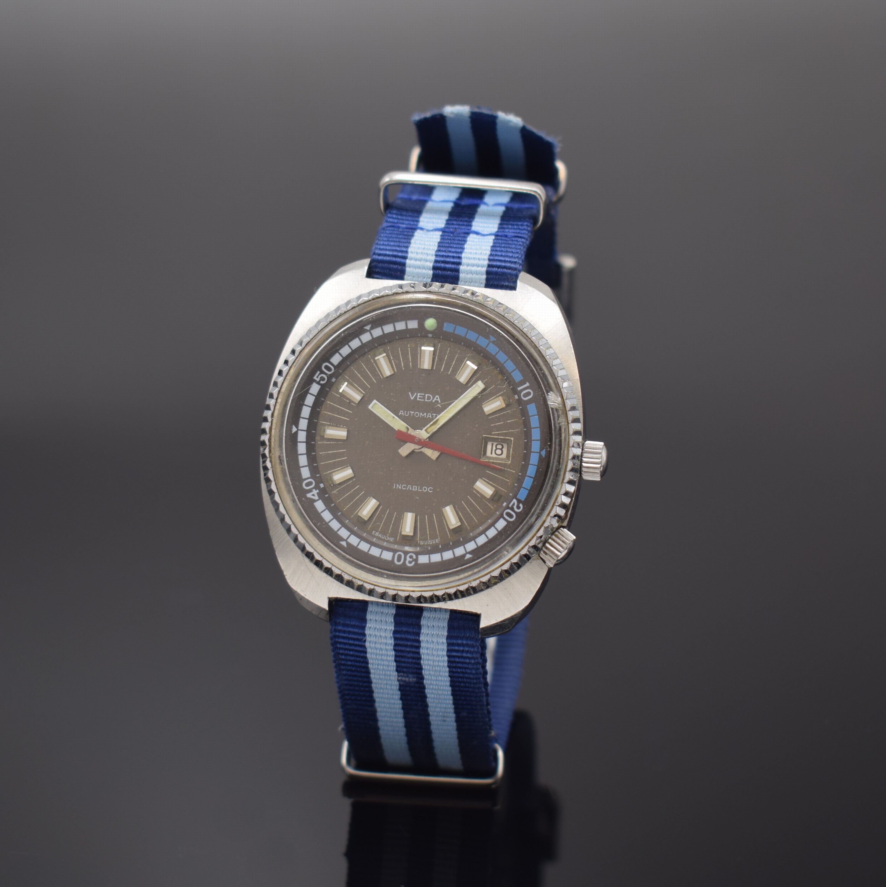 VEDA grosse Taucheruhr, Schweiz um 1970, Automatik, Edelstahlgeh., Boden verschr., Zifferbl. m. aufgel. Indizes fl./pat., innen- liegende Lünette ...