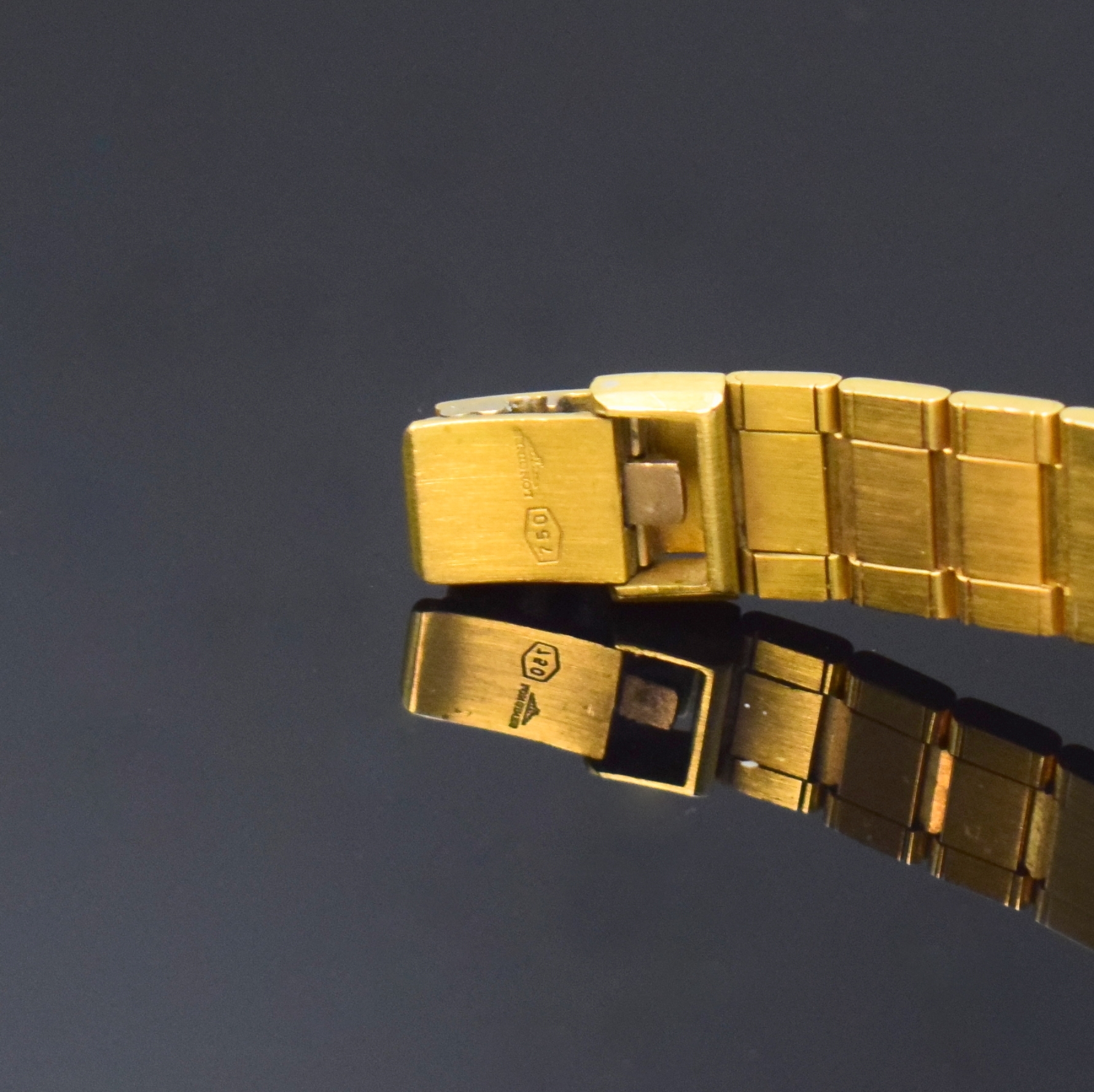 Detail c: LONGINES Damenarmbanduhr in GG 750/000, quarz, massives Gliederband, Boden aufgedr., gold. Zifferbl. m. aufgel. Indizes, Anz. v. Std., Min., ...