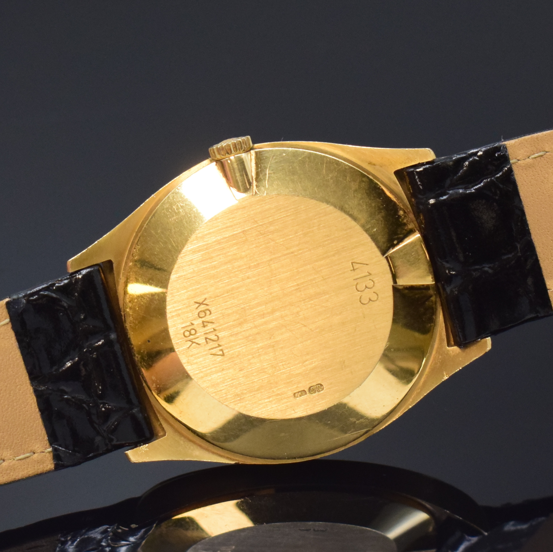 Detail e: ROLEX Herrenarmbanduhr Serie Cellini in GG 750/000 Referenz 4133, Handaufzug, Schweiz um 1993, Lederband m. orig. GG 750/000 Dornschl., Boden ...
