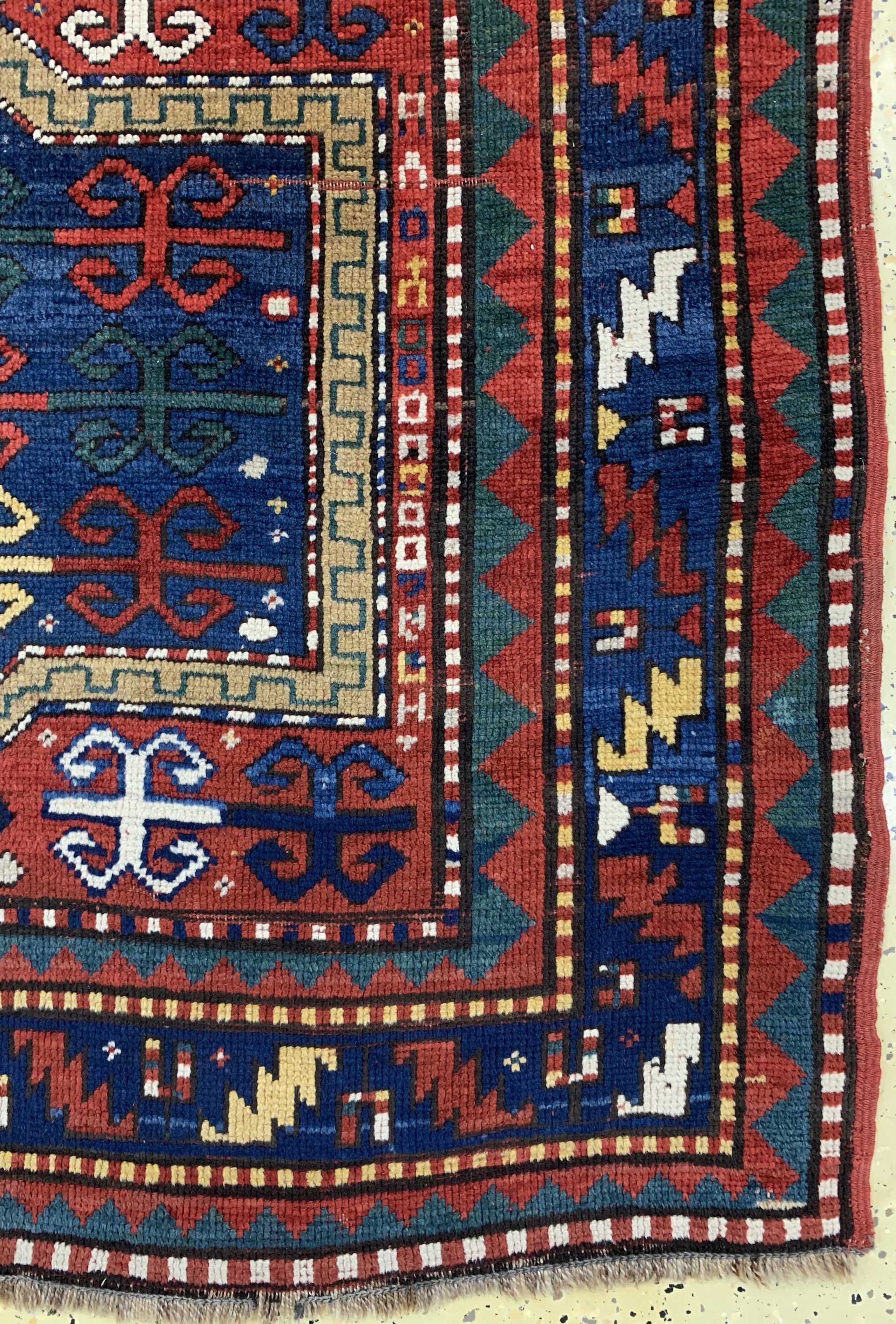 Detail a: Antiker Kazak, Kaukasus, ca. im 1900 Jahre,Wolle auf Wolle, ca. 230 x 125 cm, EHZ: 3