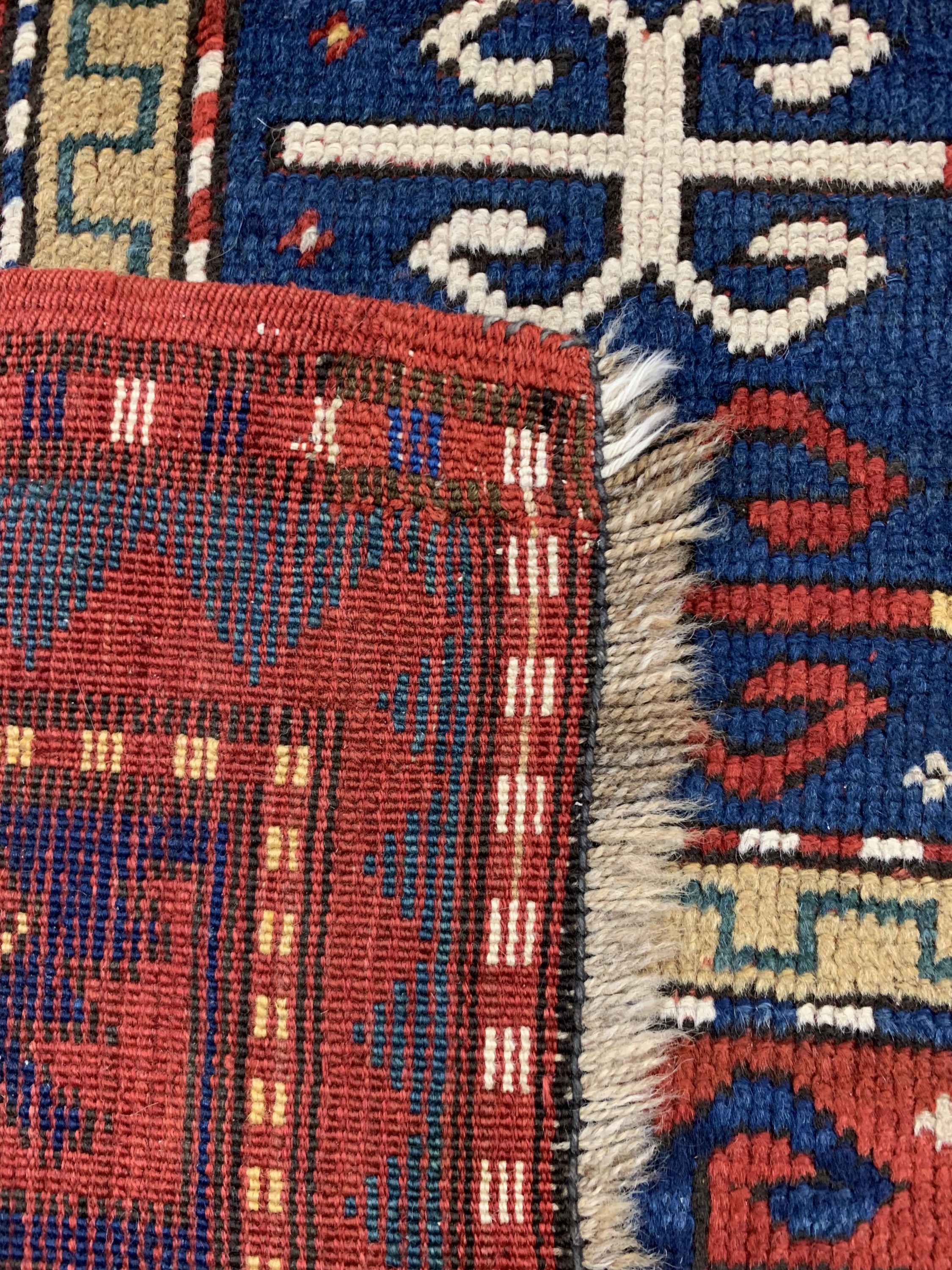 Detail g: Antiker Kazak, Kaukasus, ca. im 1900 Jahre,Wolle auf Wolle, ca. 230 x 125 cm, EHZ: 3