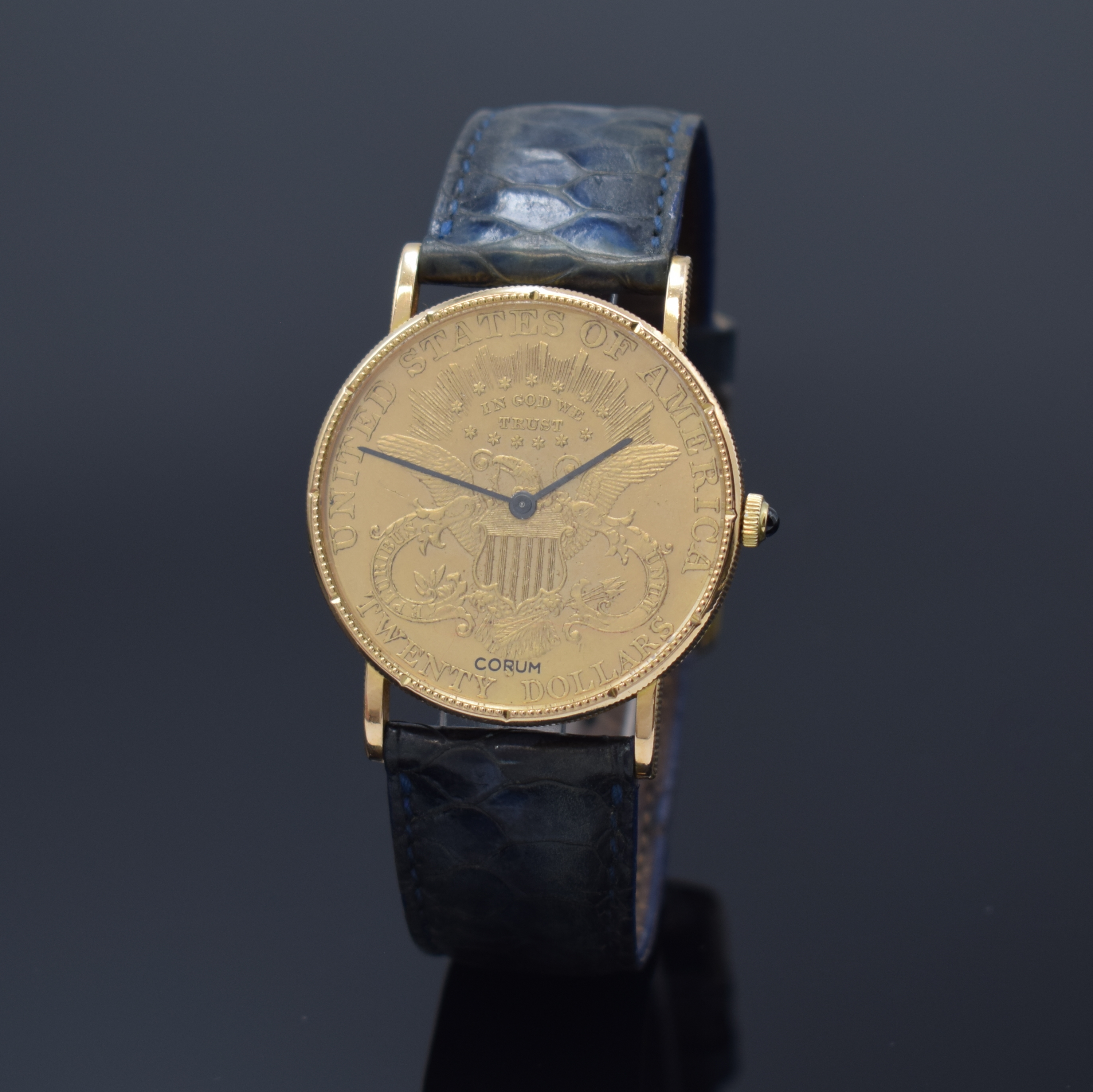 CORUM Twenty Dollars 1892 Herrenarmbanduhr sog. Coinwatch, Schweiz um 1980, Handaufzug, in Form einer 20 US-Dollarmünze Golden Eagle, GG 750/000 ...