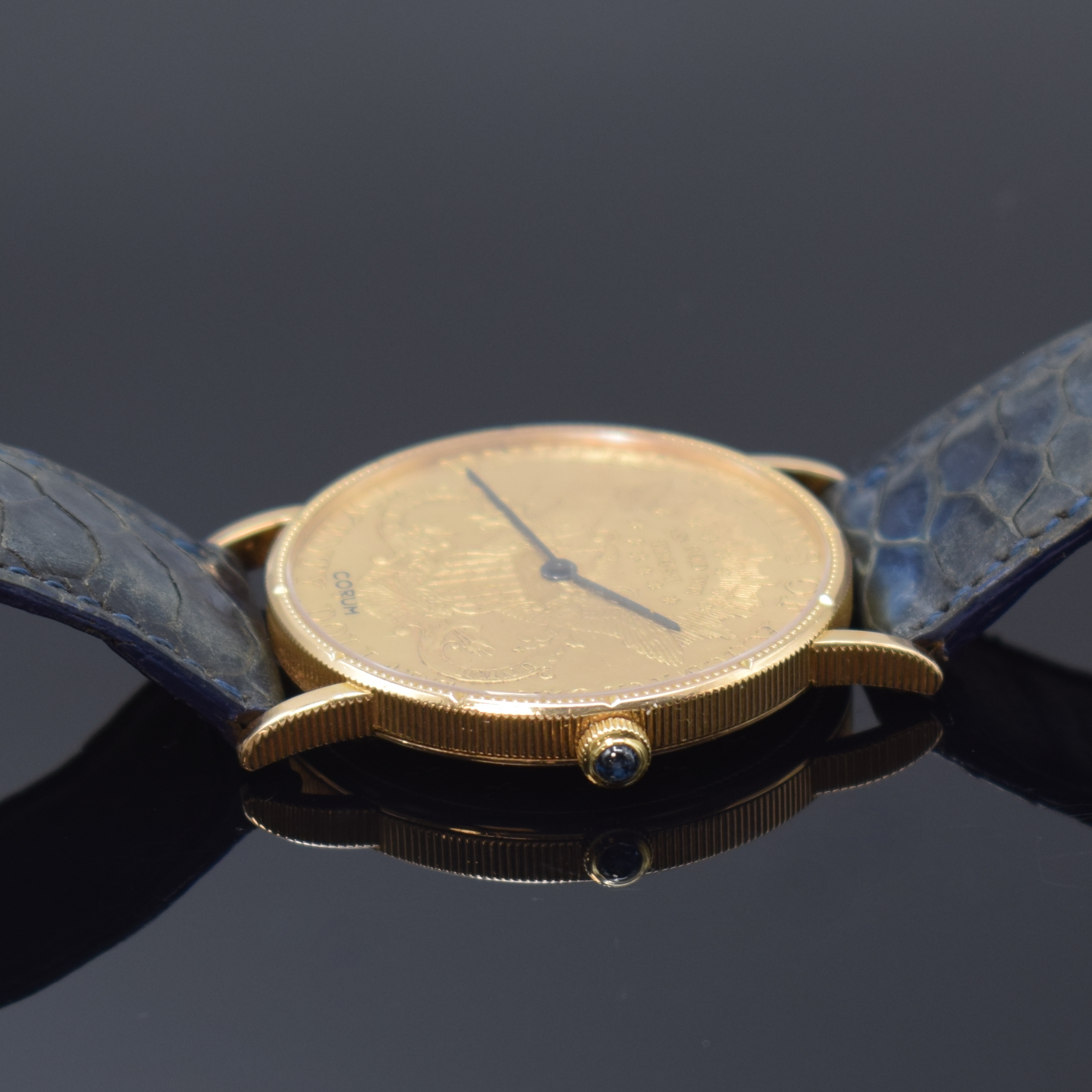 Detail b: CORUM Twenty Dollars 1892 Herrenarmbanduhr sog. Coinwatch, Schweiz um 1980, Handaufzug, in Form einer 20 US-Dollarmünze Golden Eagle, GG 750/000 ...
