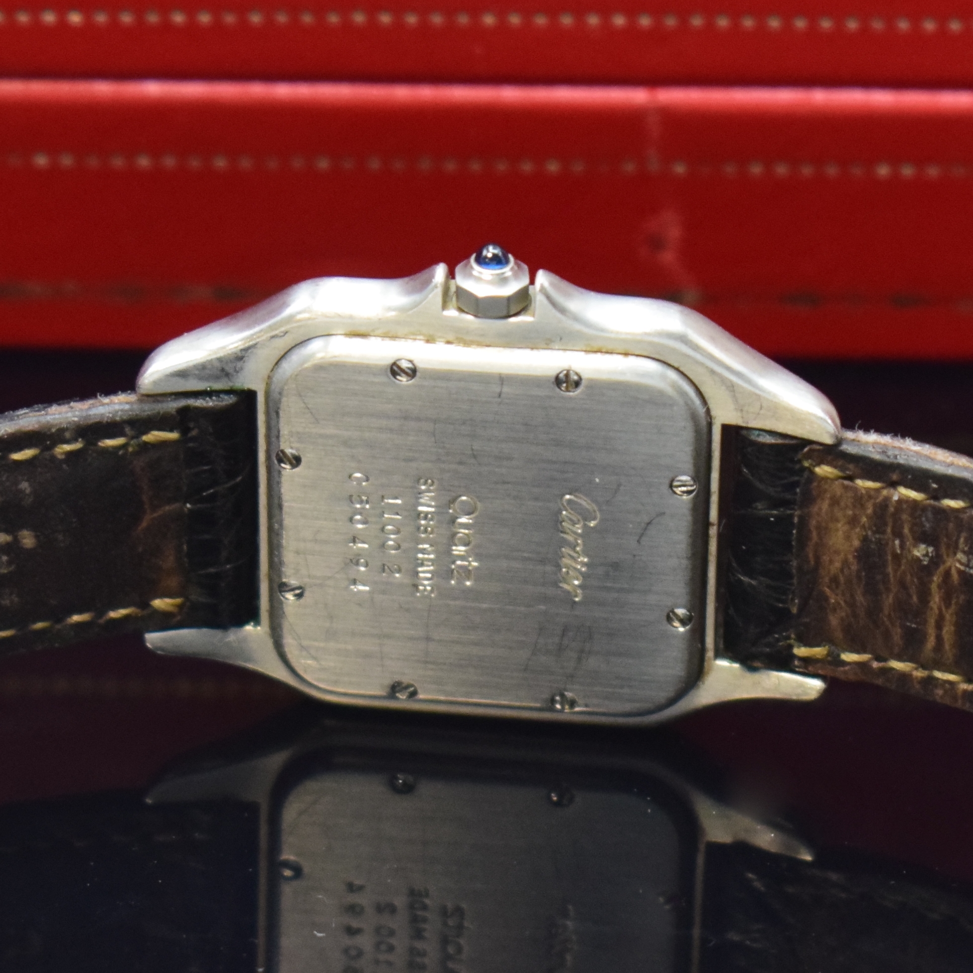 Detail d: CARTIER Panthere Damenarmbanduhr in Stahl/Gold Referenz 1100, quarz, Boden 8-fach verschr., Lederband (zu ers.) m. orig. Faltschl., Schmuckkrone, ...