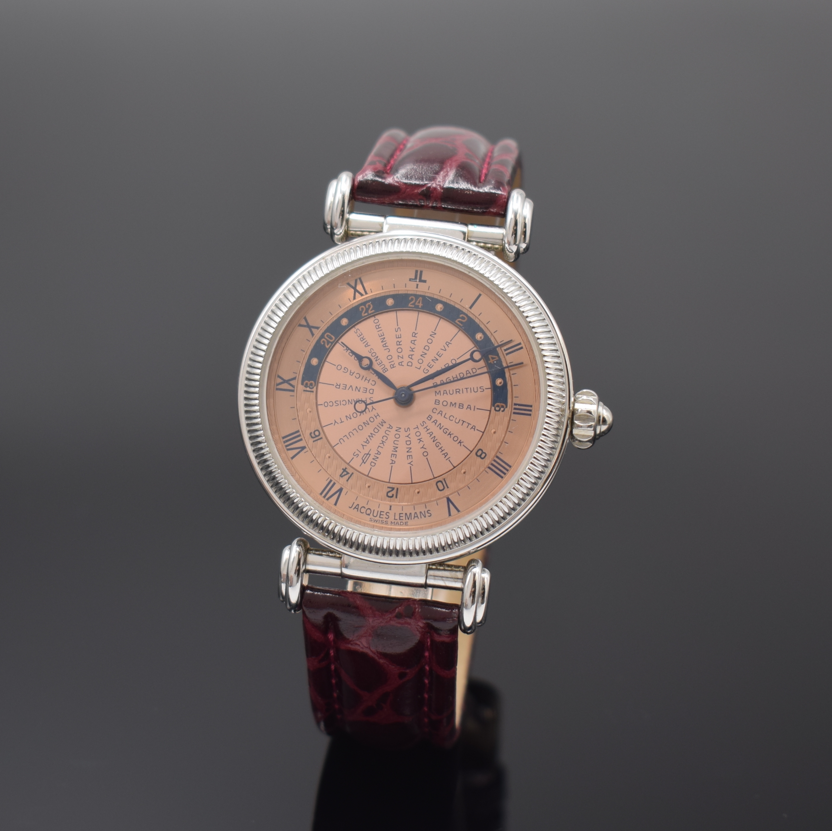 JAQUES LEMANS Herrenarmbanduhr Worldtimer Referenz 605, Automatik, Schweiz um 1995, weiss-verg. Metallgeh. inkl. orig. Lederband m.orig. Dornschl., ...