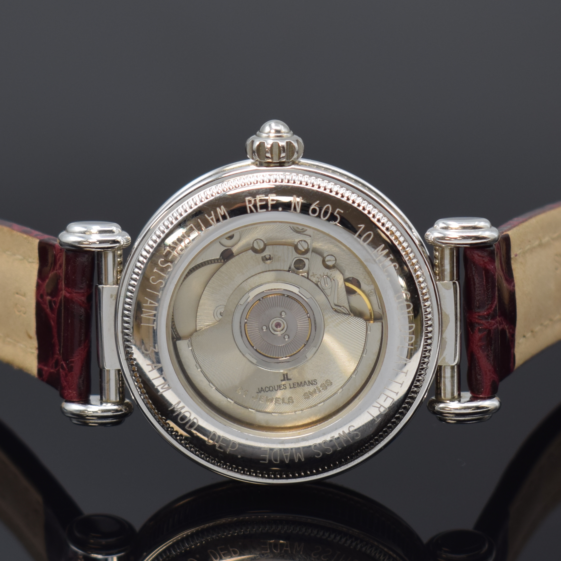 Detail c: JAQUES LEMANS Herrenarmbanduhr Worldtimer Referenz 605, Automatik, Schweiz um 1995, weiss-verg. Metallgeh. inkl. orig. Lederband m.orig. Dornschl., ...