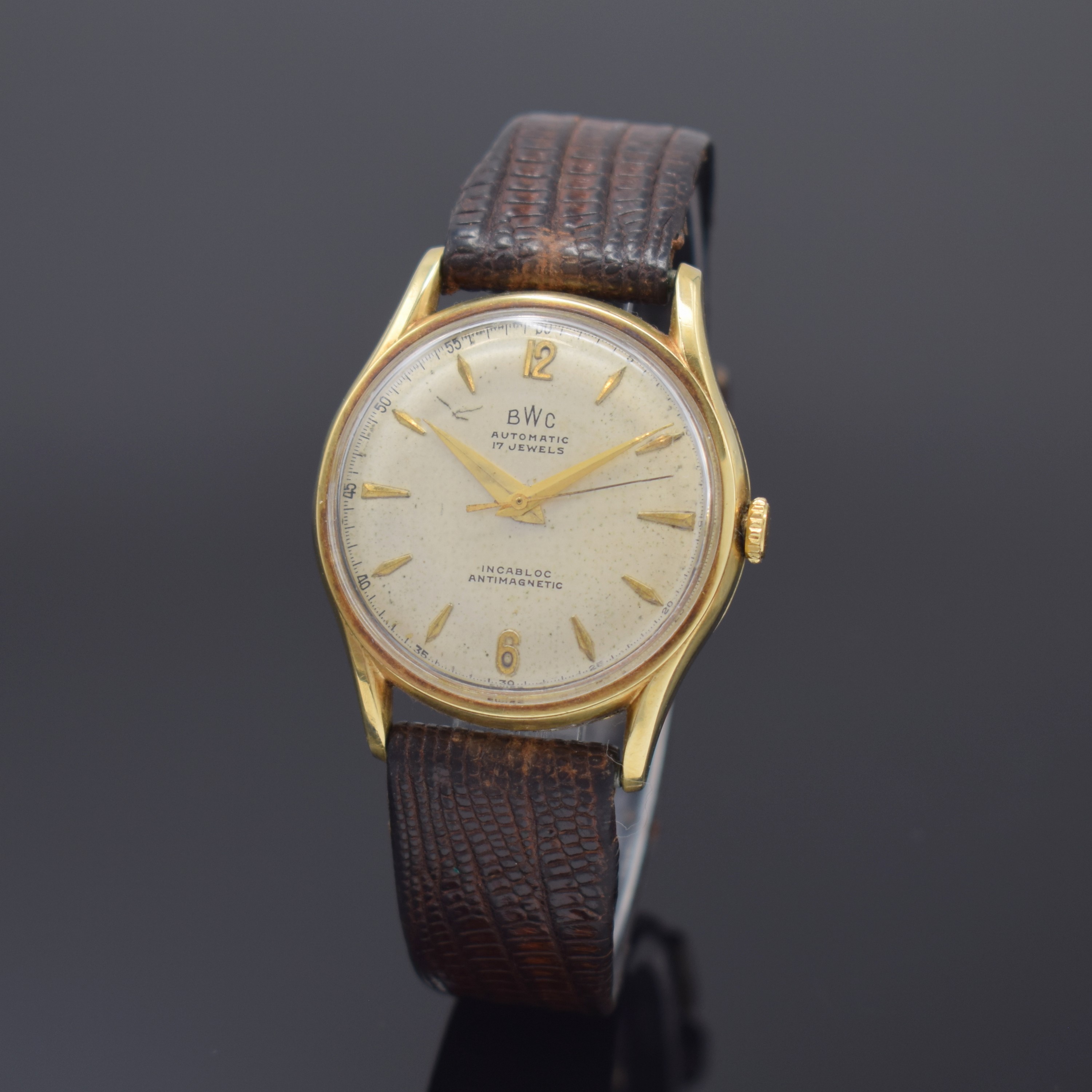 BWC Herrenarmbanduhr in GG 585/000, Automatik, Schweiz 1950er Jahre, dell. Boden und Glasrand aufgedr., vers. Zifferbl. mit aufgel. Std.-Zeichen ...