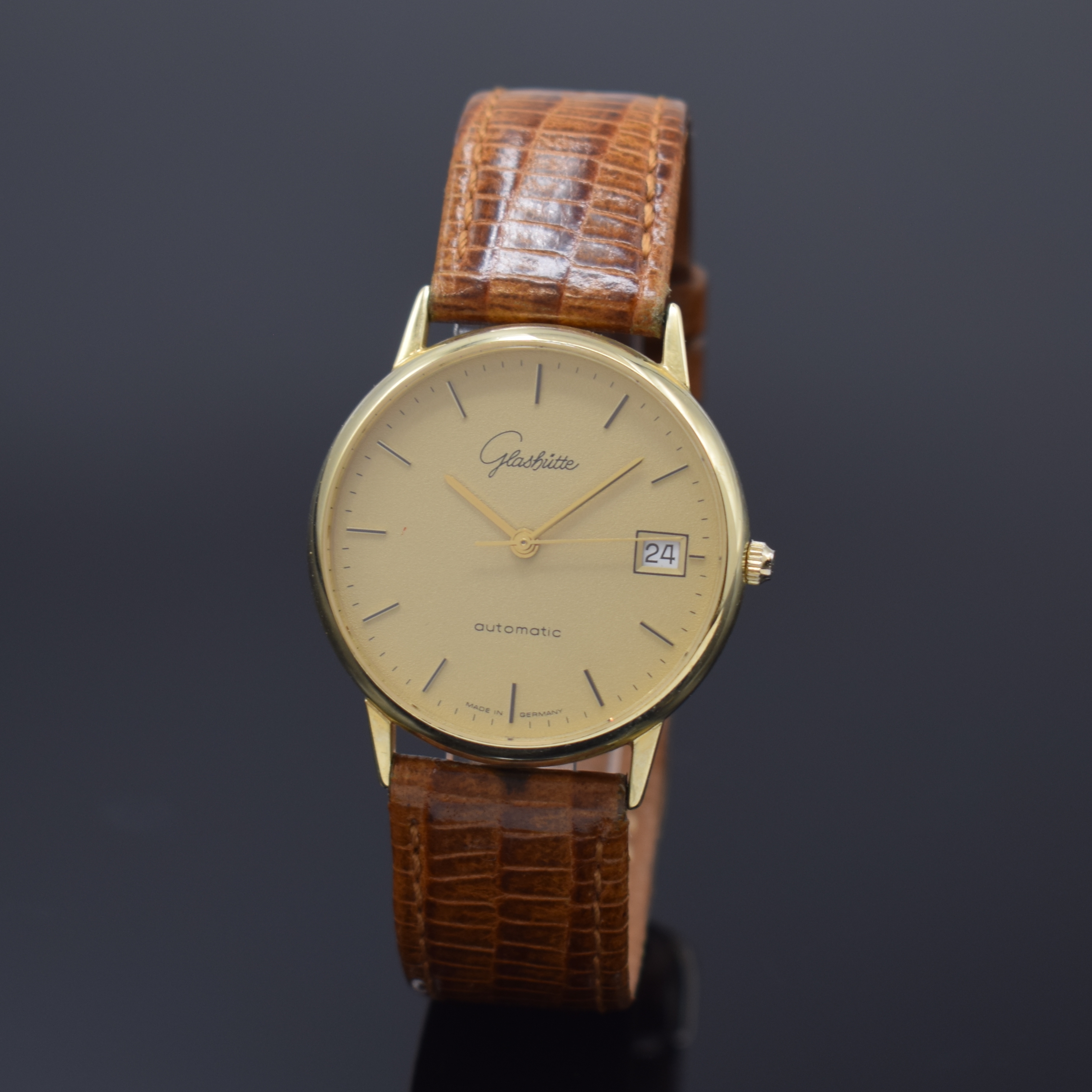 GLASHÜTTE seltene Herrenarmbanduhr in GG 585/000, Deutschland um 1992, eine der ersten in geringer Stückzahl gefertigten Serienuhren in Gold, Boden ...