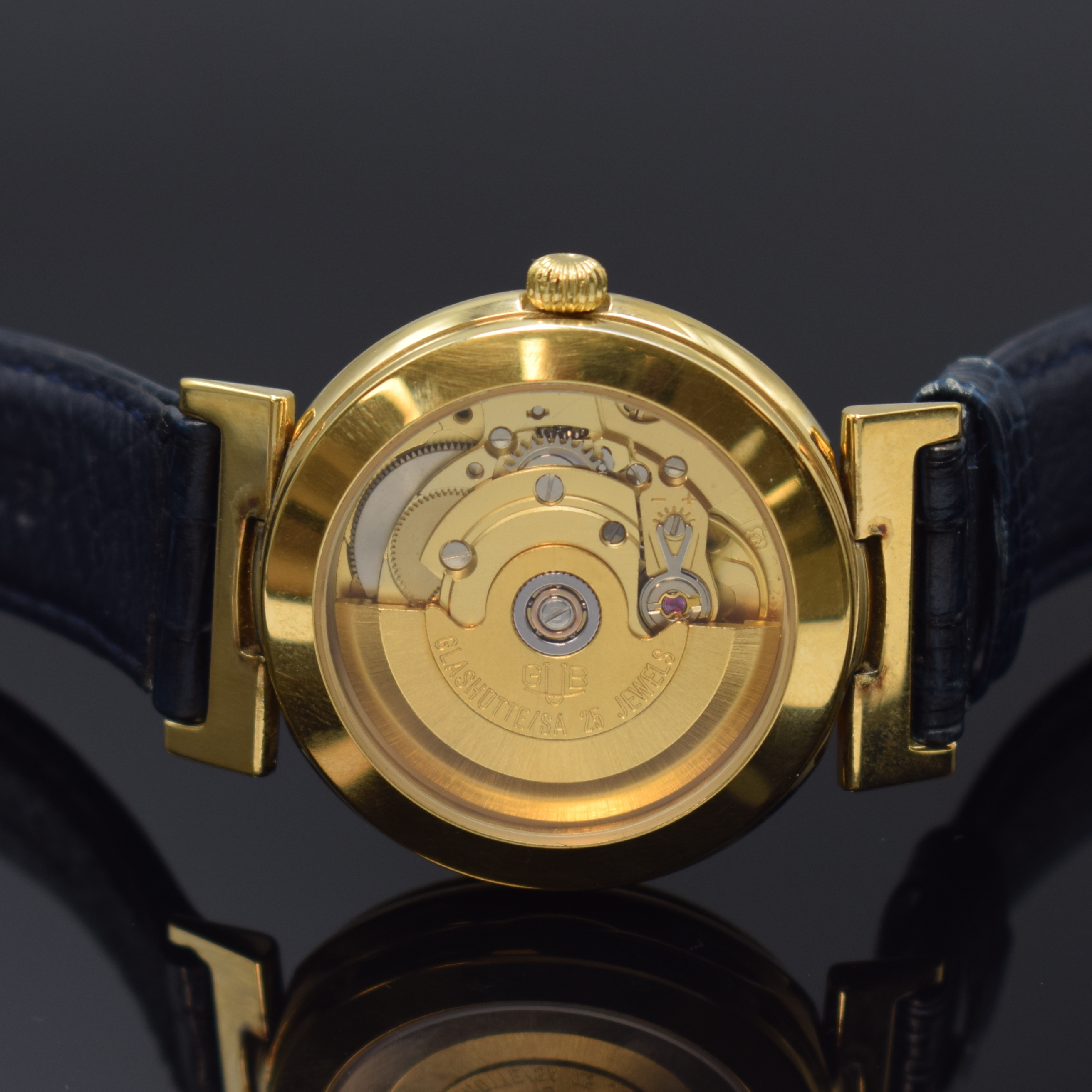Detail c: MERCEDES BENZ/GUB Herrenarmbanduhr, Deutschland um 1990, verg. Metallgeh. beids. vergl., Boden aufgedr., bewegl. Bandanst., Anz. v. Std., Min., ...