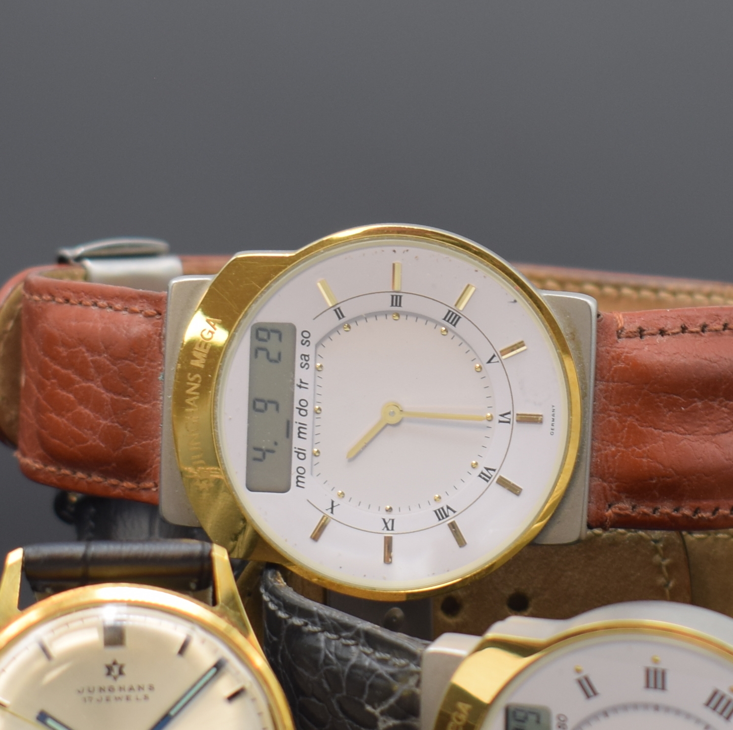 Detail b: Konvolut: 3 Junghans Armbanduhren, 1 x Handaufzug, 2 x Serie Mega, Deutschland 1970er/90er Jahre, 1 x vergoldet, Edelstahlboden aufgedr., 17 St., ...