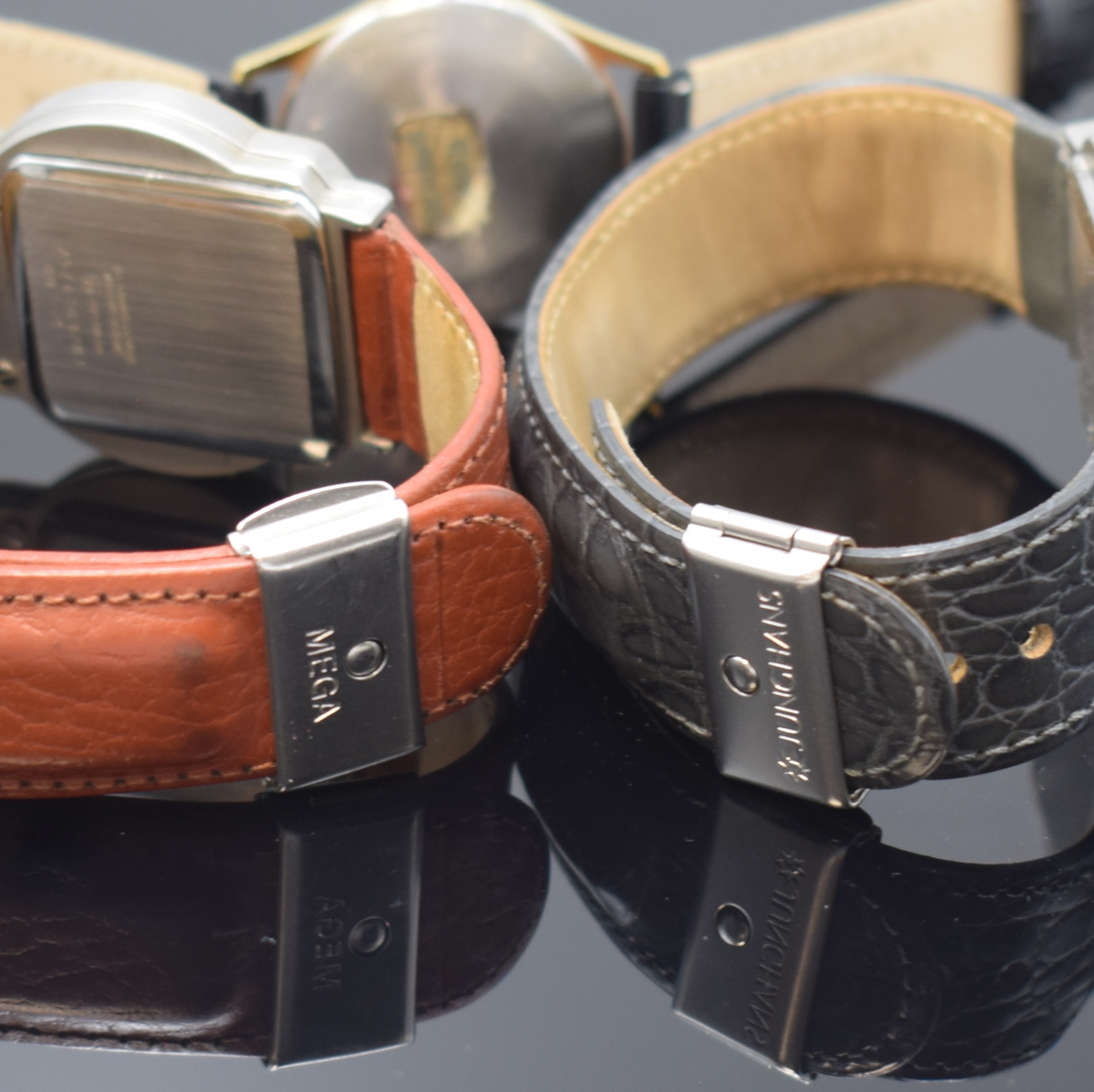 Detail d: Konvolut: 3 Junghans Armbanduhren, 1 x Handaufzug, 2 x Serie Mega, Deutschland 1970er/90er Jahre, 1 x vergoldet, Edelstahlboden aufgedr., 17 St., ...