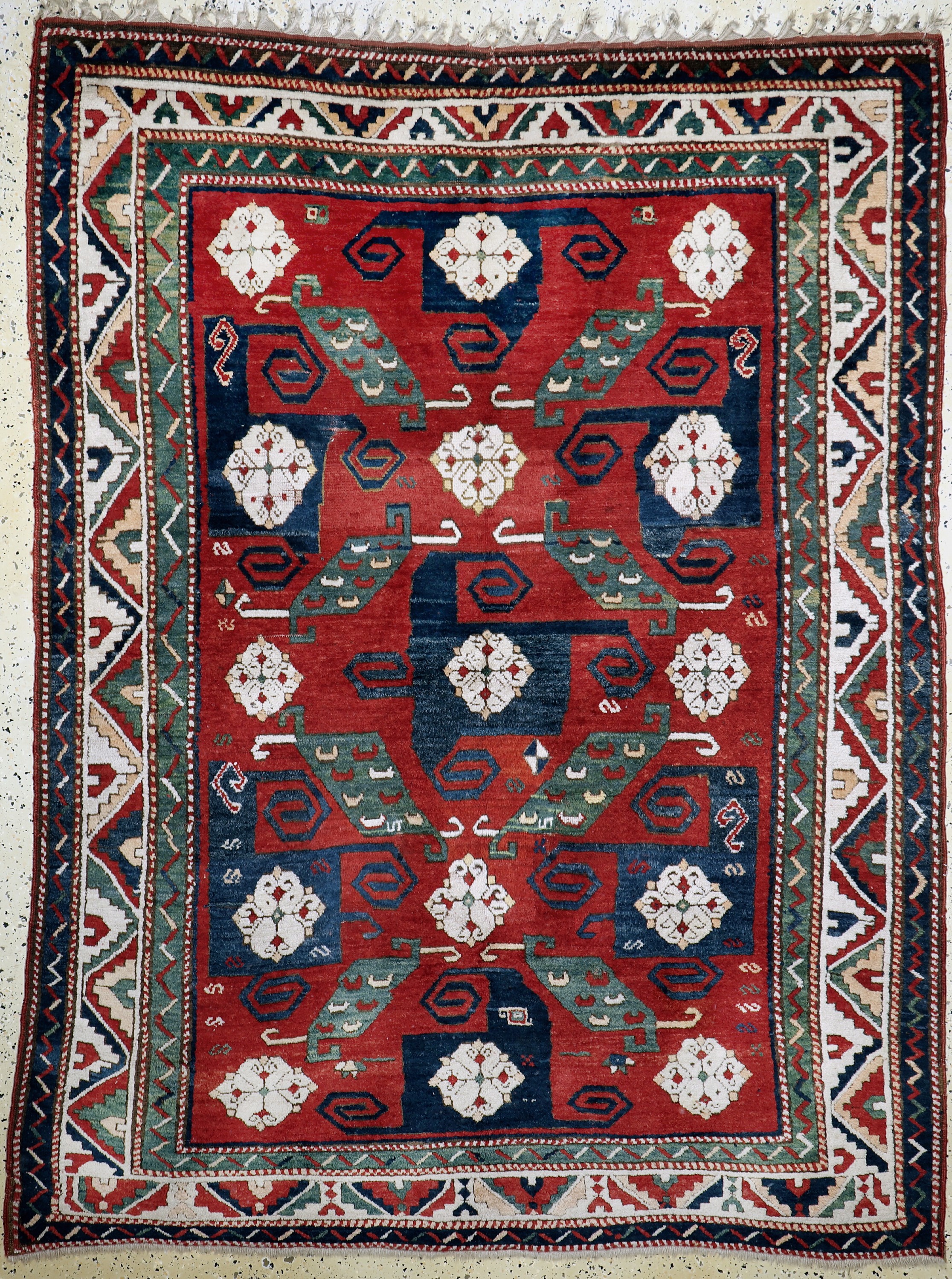 "Pinwheel"kazak antik, (Swastika), Kaukasus, Mitte 19.Jhd, Wolle auf Wolle, ca. 230 x 170 cm, EHZ: 2, (kleine alte Restaurierungen).