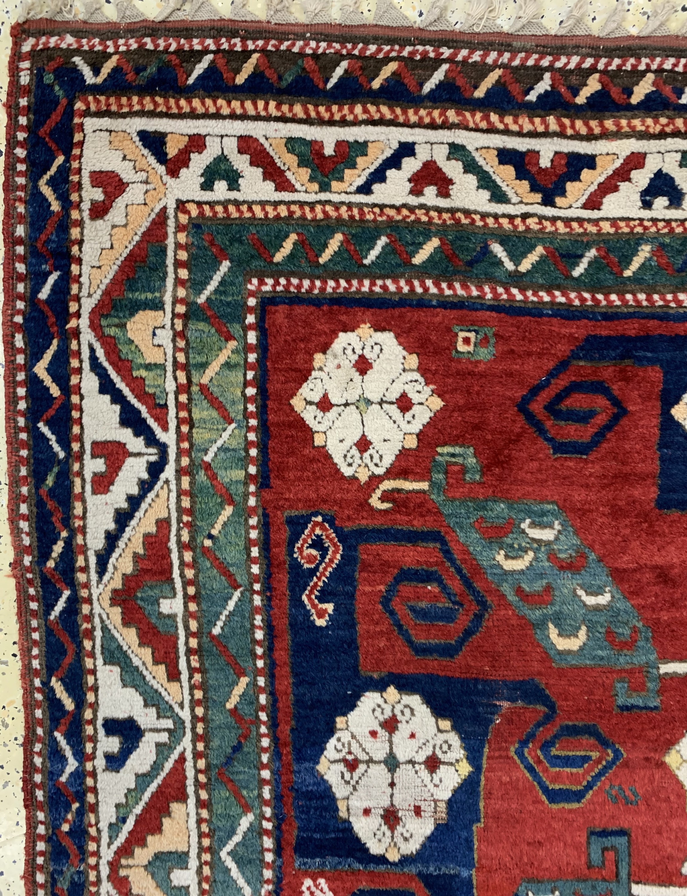 Detail e: "Pinwheel"kazak antik, (Swastika), Kaukasus, Mitte 19.Jhd, Wolle auf Wolle, ca. 230 x 170 cm, EHZ: 2, (kleine alte Restaurierungen).