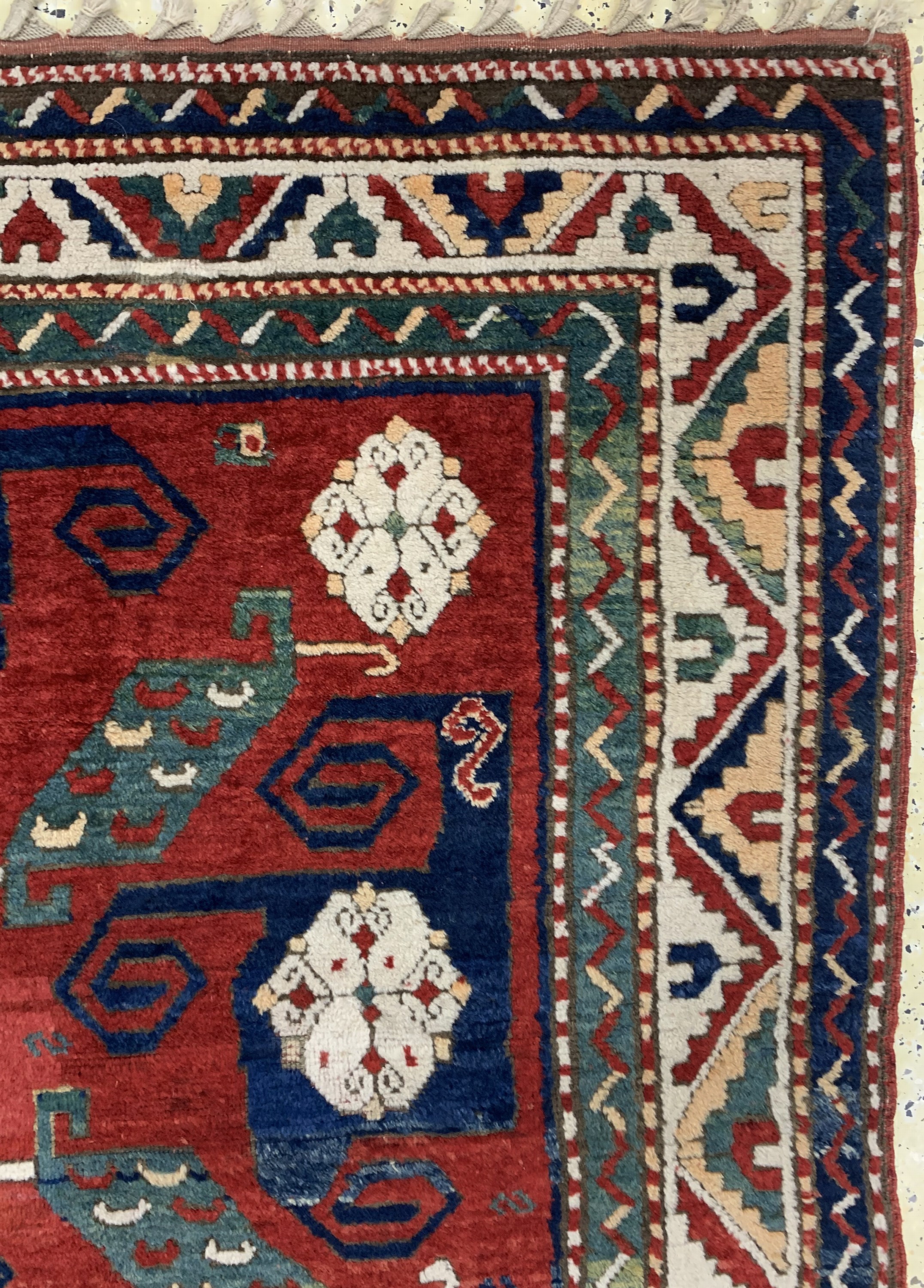 Detail f: "Pinwheel"kazak antik, (Swastika), Kaukasus, Mitte 19.Jhd, Wolle auf Wolle, ca. 230 x 170 cm, EHZ: 2, (kleine alte Restaurierungen).