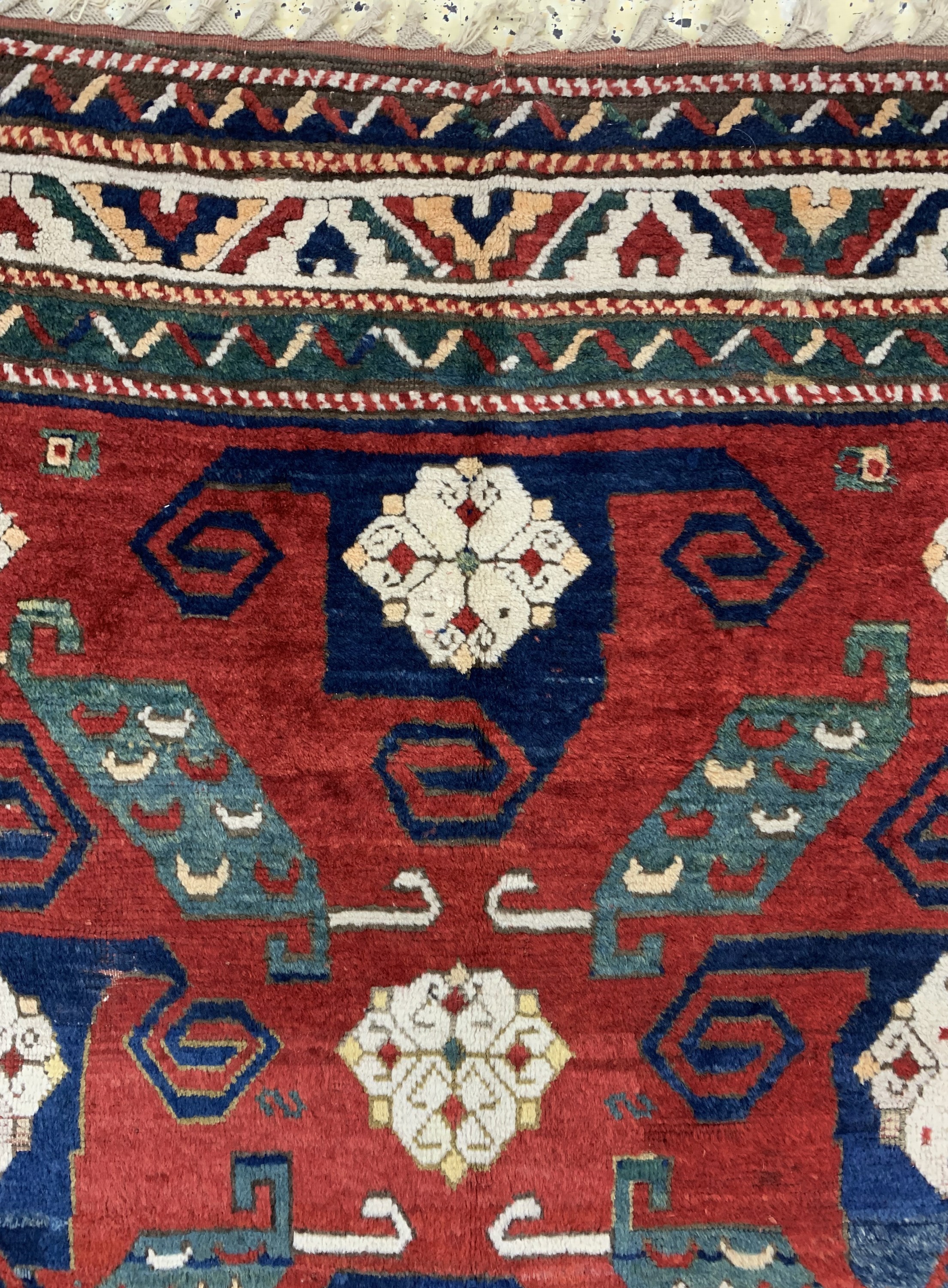 Detail g: "Pinwheel"kazak antik, (Swastika), Kaukasus, Mitte 19.Jhd, Wolle auf Wolle, ca. 230 x 170 cm, EHZ: 2, (kleine alte Restaurierungen).