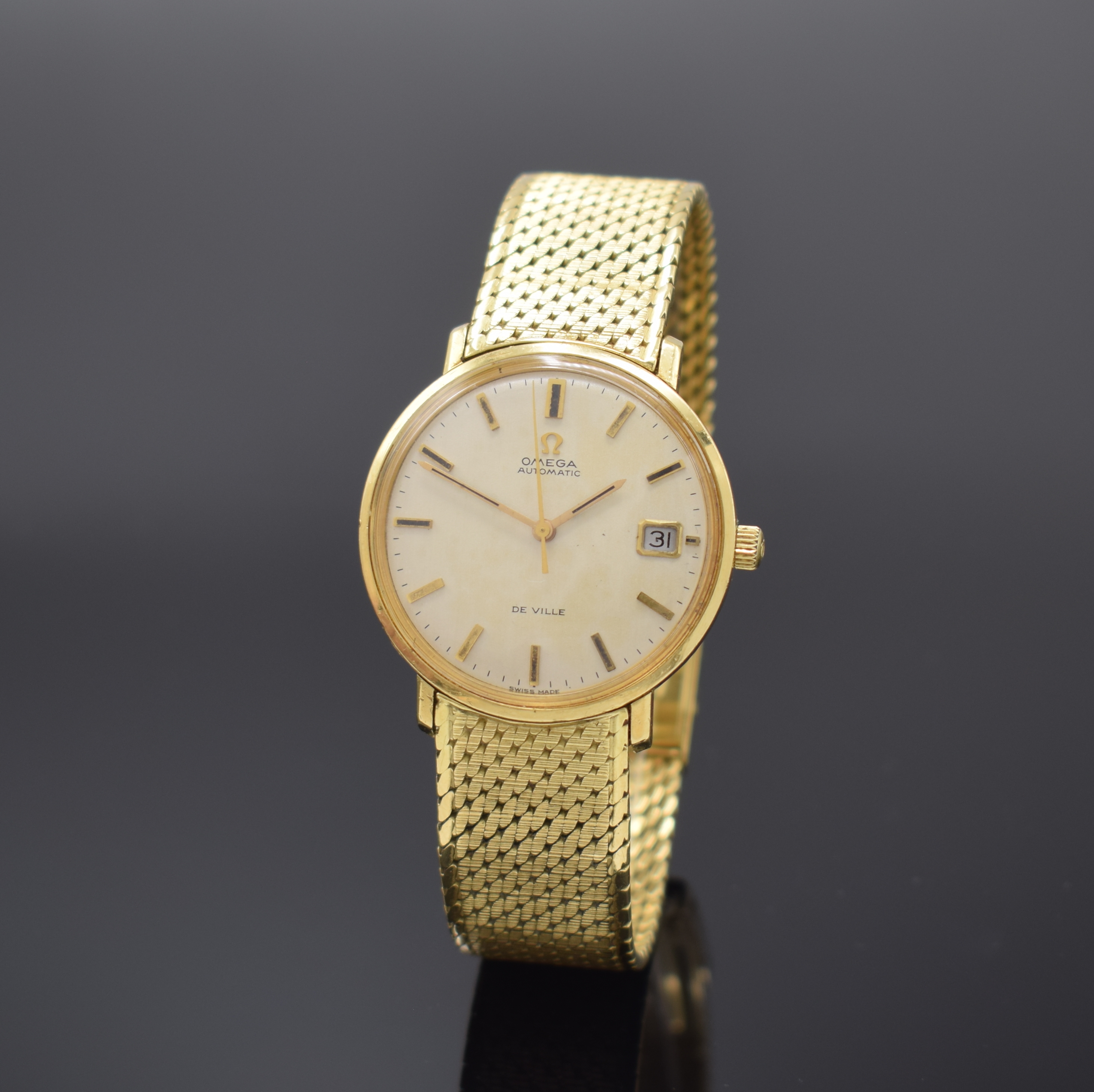OMEGA De Ville Referenz 166033 Armbanduhr in GG 750/000 an original Goldband, Schweiz um 1969, Automatik, Monocoque-Geh., orig. Glas u. Krone, silb. ...