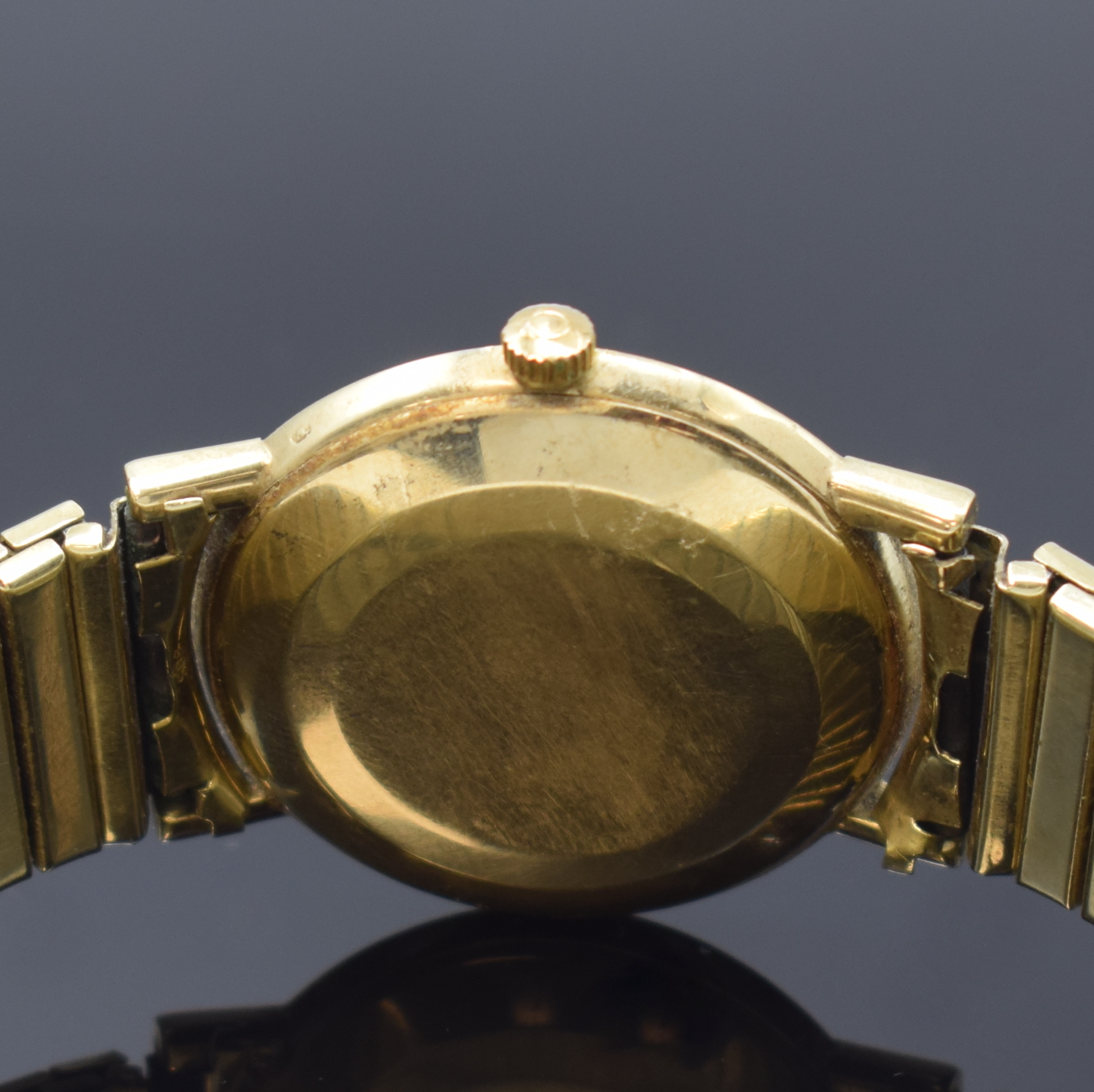 Detail c: OMEGA Armbanduhr Referenz 161009 an neutralem Flexband in GG 585/000, Schweiz um 1964, Automatik, 3-tlg. Goldgeh., Boden u. Glasrand aufgedr., silb. ...