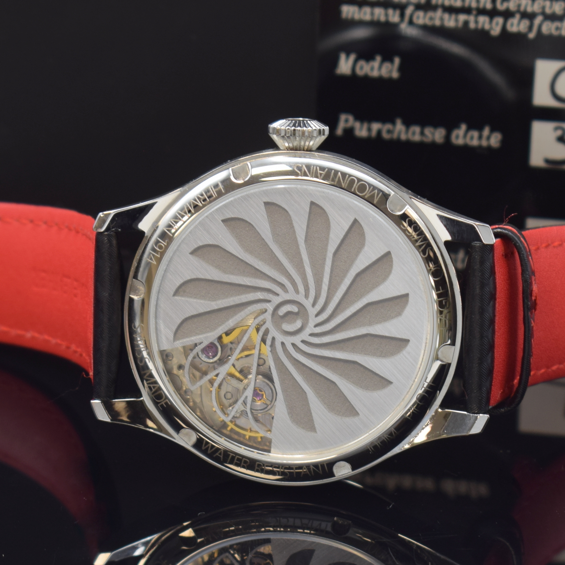 Detail d: HERMANN Celestial Herrenarmbanduhr in Stahl,Schweiz verk. lt. beil. Garantie 10/2023, Handaufzug, beids. vergl. Geh., Lederband m. orig. Dornschl., ...
