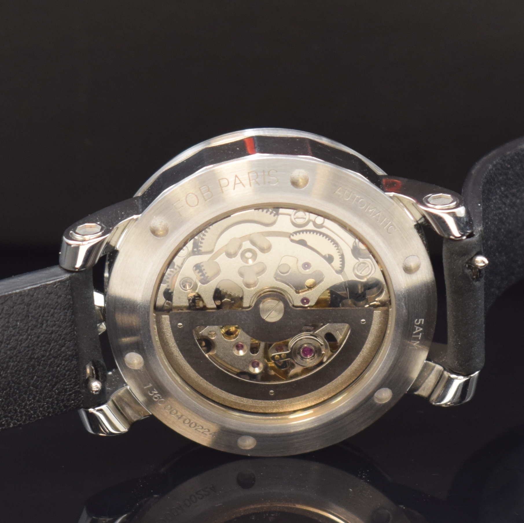 Detail d: FOB Paris skelettierte Armbanduhr in Stahl, Frankreich um 2020, Automatik, beids. vergl. Geh., Boden verschr., Lederband inkl. orig. Dornschl., ...