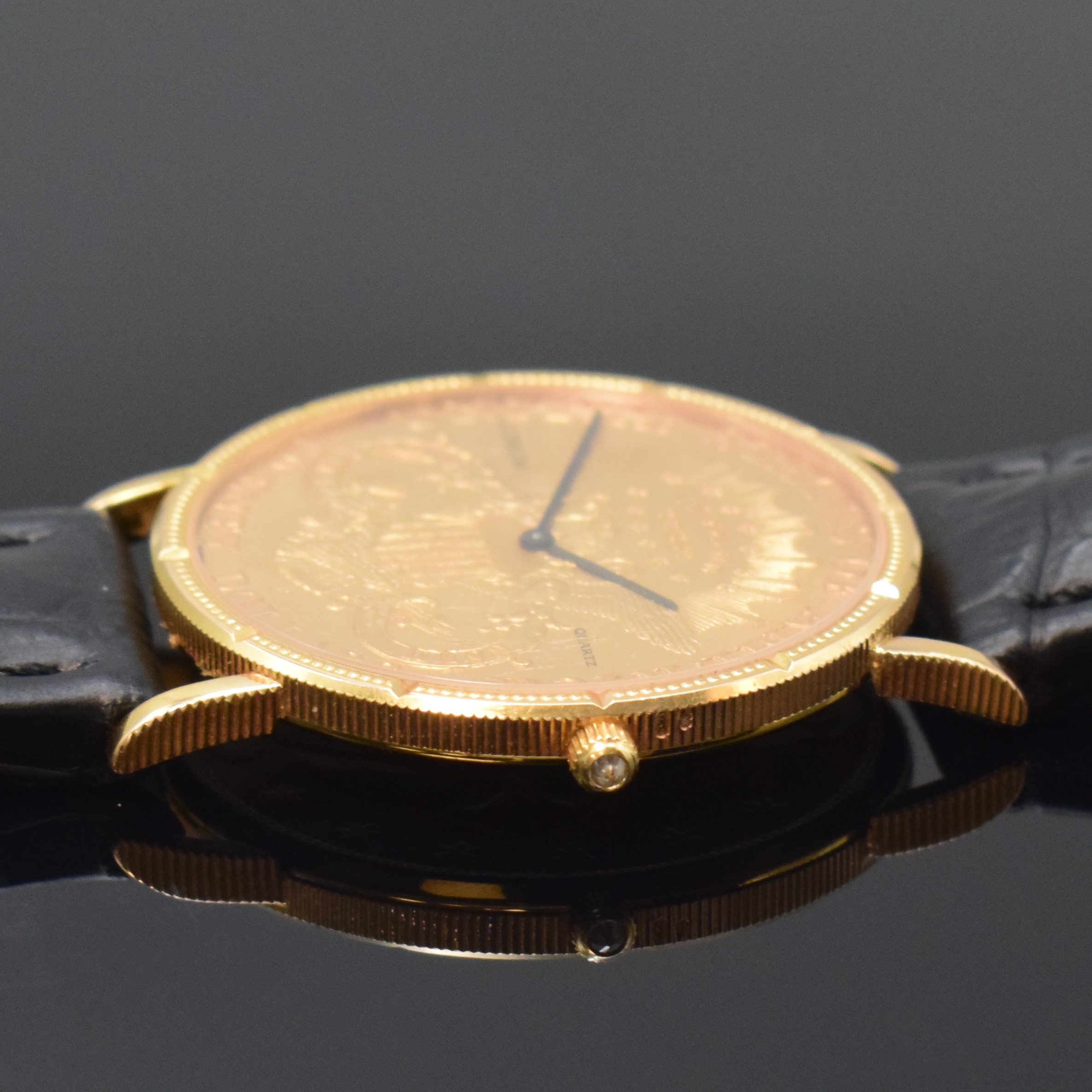 Detail b: CORUM Twenty Dollars 1904 Herrenarmbanduhr sogenannte Coinwatch, Schweiz um 1980, quarz, in Form einer 20 US-Dollarmünze Golden Eagle, GG 750/000 ...