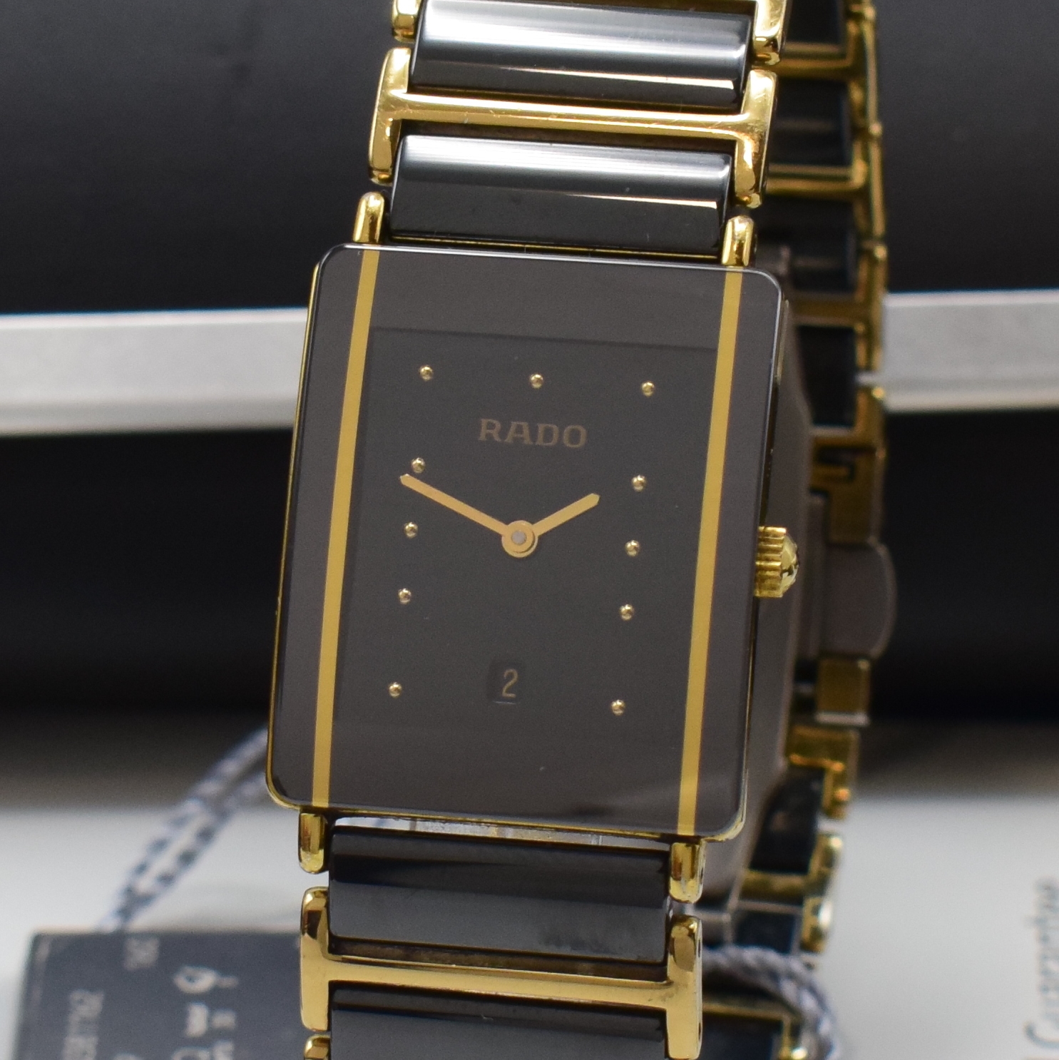 Detail a: RADO Diastar Armbanduhr Referenz 160.0381.3, Schweiz um 2005, quarz, verg. Gehäuse, Boden 4-fach verschr., verg. Gliederband mit Keramikelementen, ...