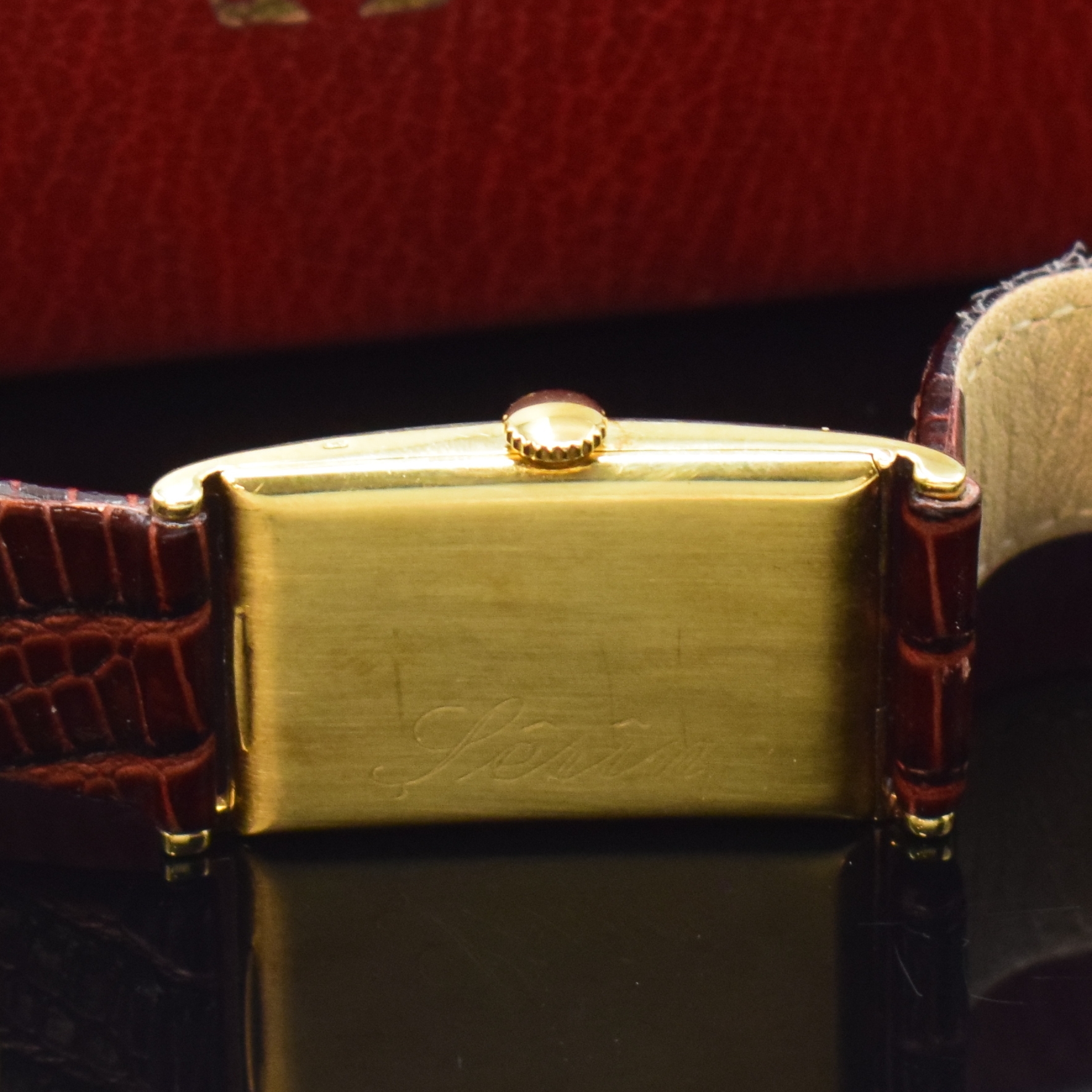 Detail b: OMEGA Herrenarmbanduhr in GG 585/000, Handaufzug, Schweiz für den dtsch. Markt um 1935, rectangulär. Scharniergeh., Boden m. Namensgravur, silb. ...