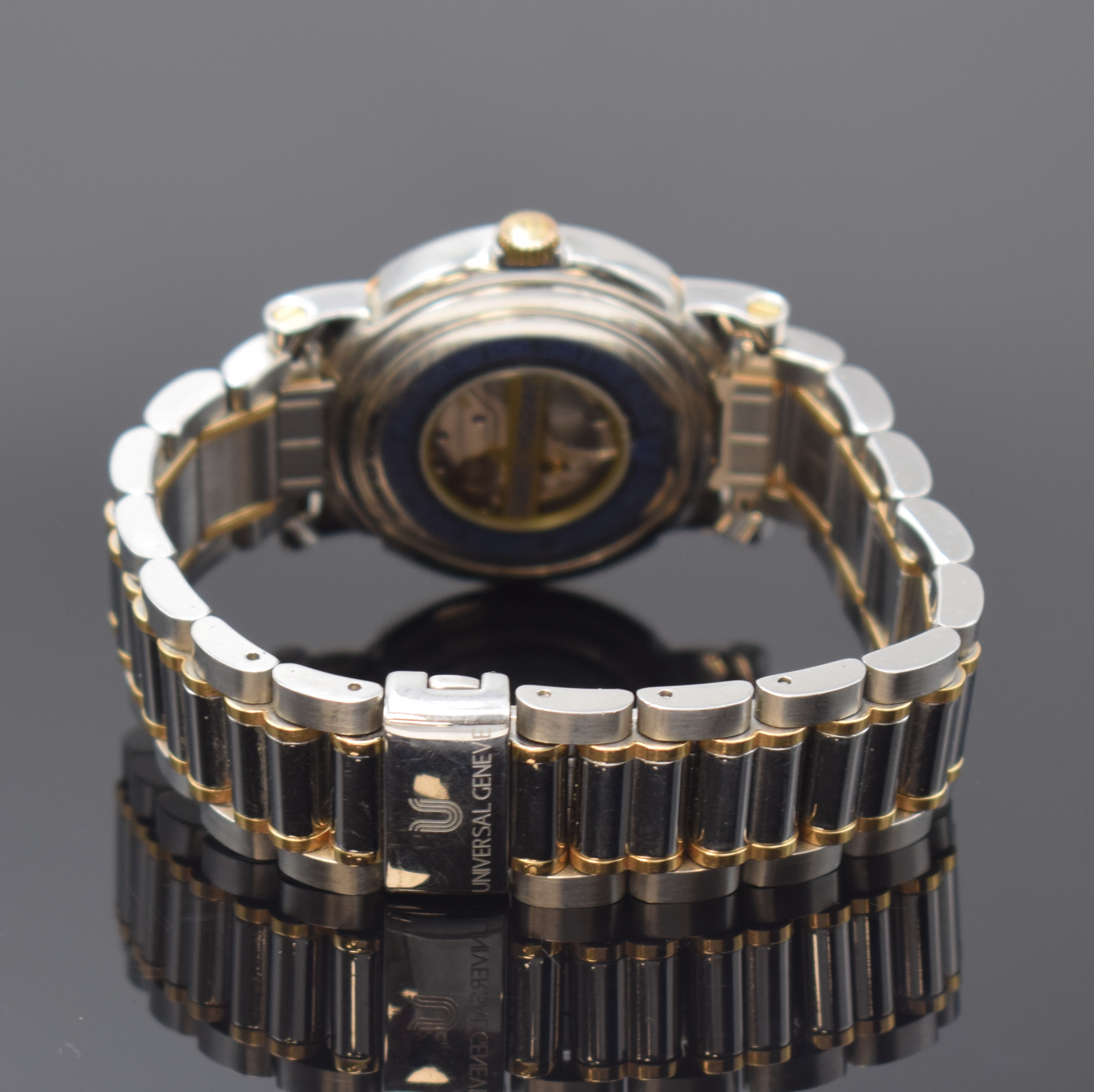 Detail b: UNIVERSAL GENEVE Armbanduhr in Stahl/Gold mit Gangreserve, Schweiz um 1990, Handaufzug, beids. verg. Geh., orig. Gliederband m. Faltschl., Lünette ...