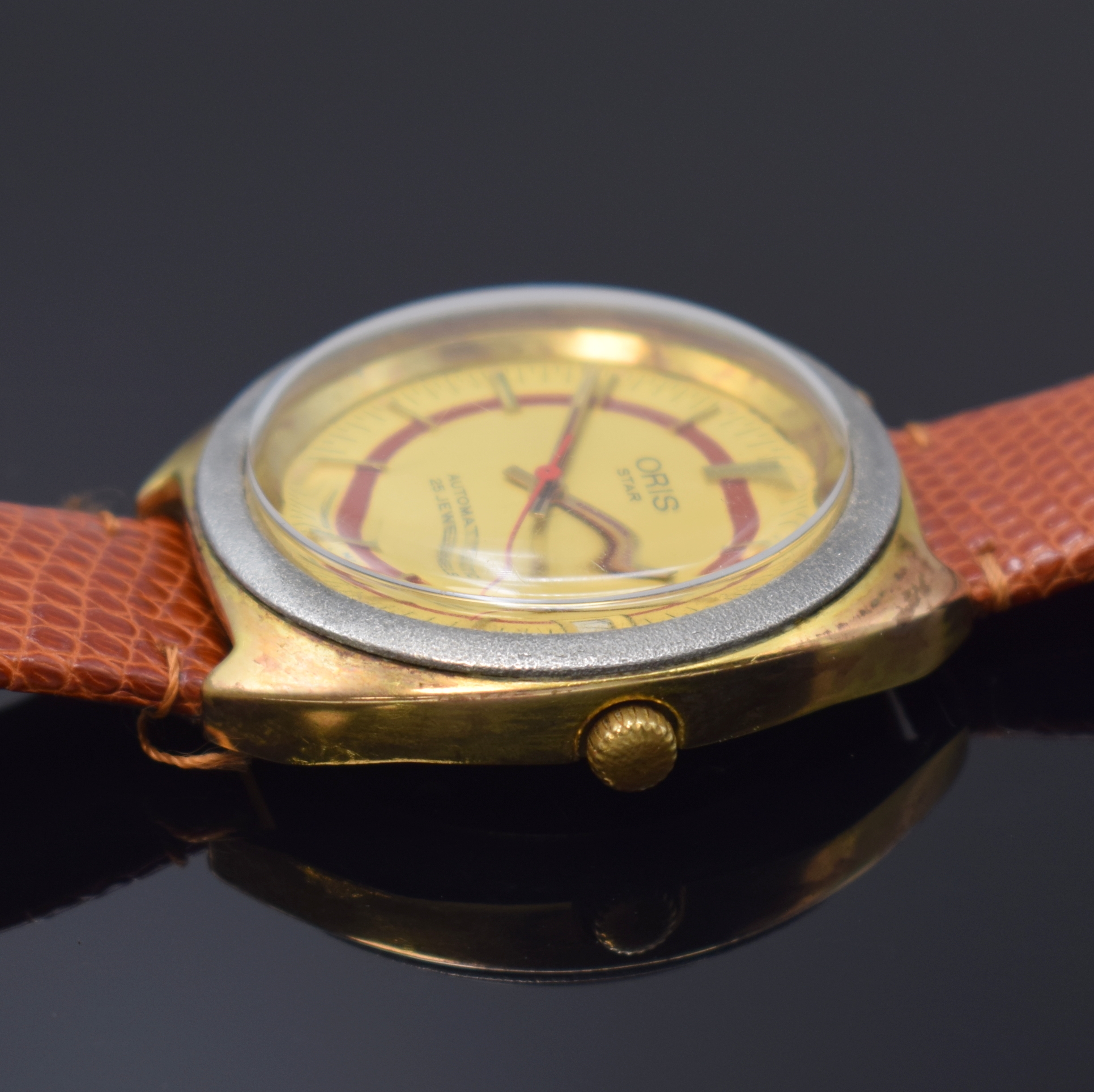 Detail b: ORIS Star vergoldete Herrenarmbanduhr, Schweiz um 1970, Automatik, Stahlboden verschr., gold. Zifferbl. m. gold. Std.-Ind., gold. Leuchtzeiger, Datum ...