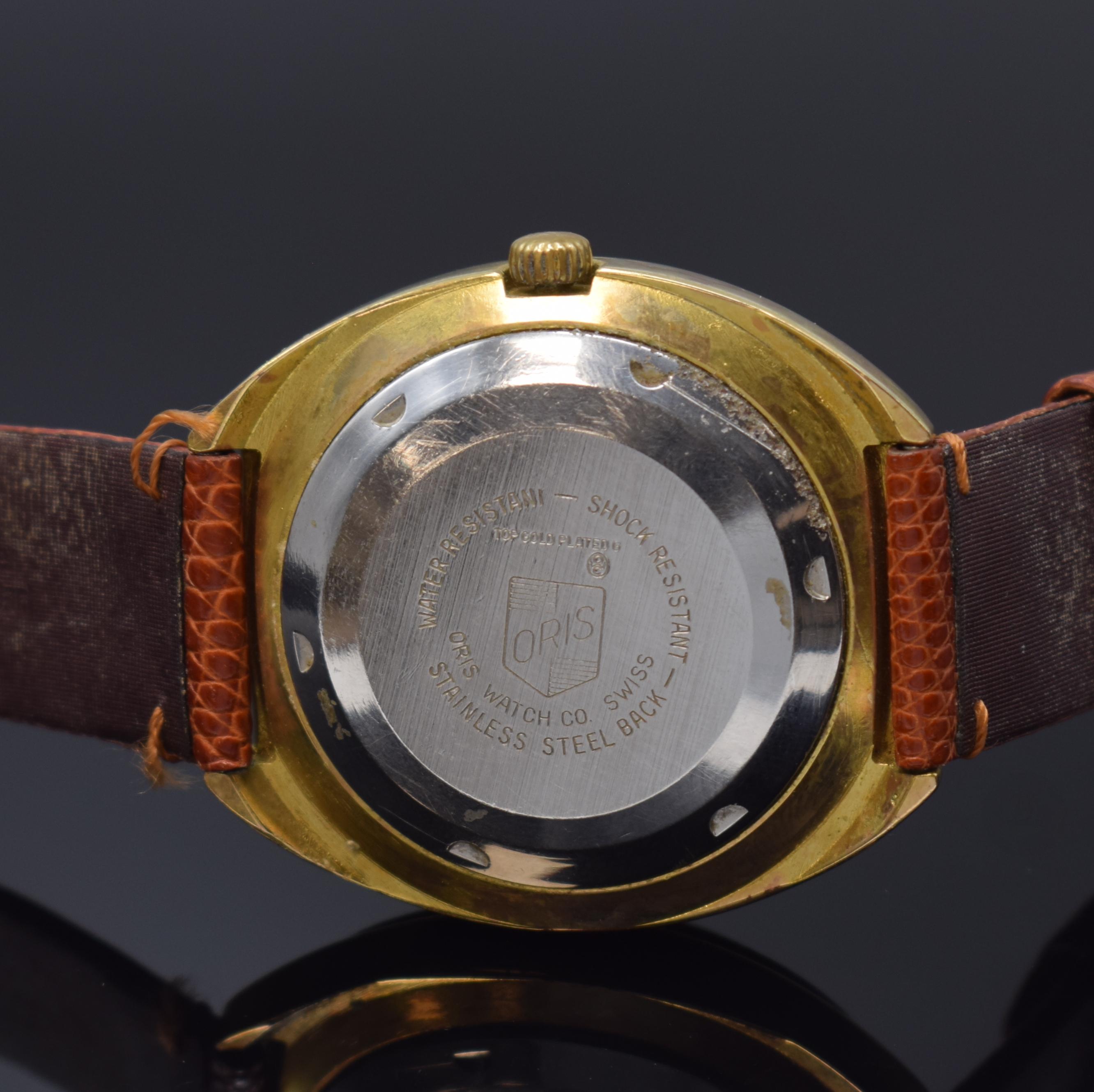 Detail c: ORIS Star vergoldete Herrenarmbanduhr, Schweiz um 1970, Automatik, Stahlboden verschr., gold. Zifferbl. m. gold. Std.-Ind., gold. Leuchtzeiger, Datum ...
