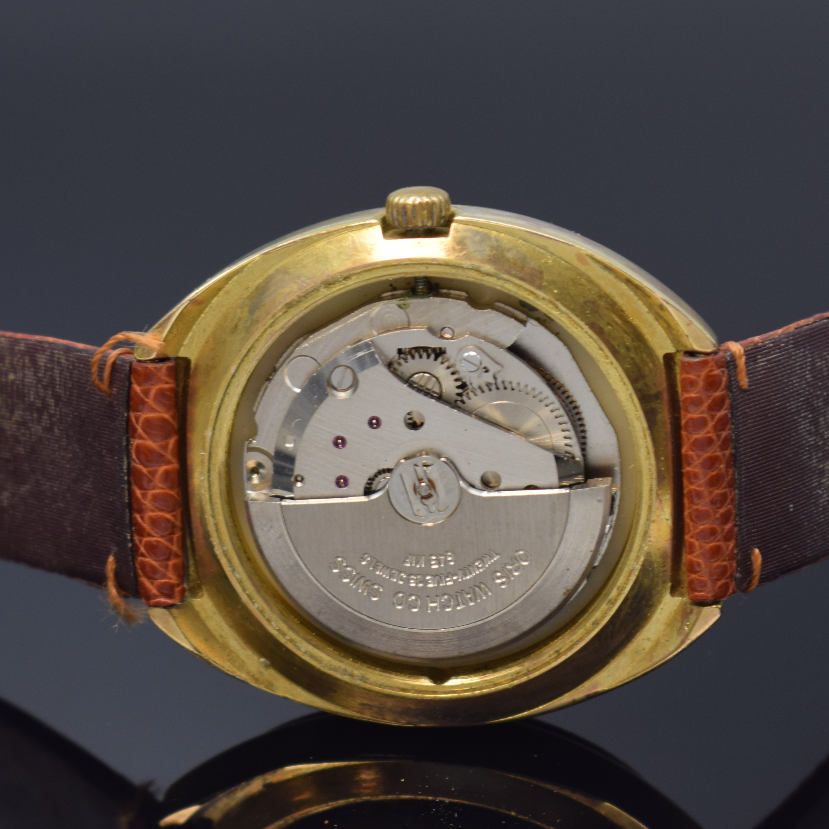 Detail d: ORIS Star vergoldete Herrenarmbanduhr, Schweiz um 1970, Automatik, Stahlboden verschr., gold. Zifferbl. m. gold. Std.-Ind., gold. Leuchtzeiger, Datum ...