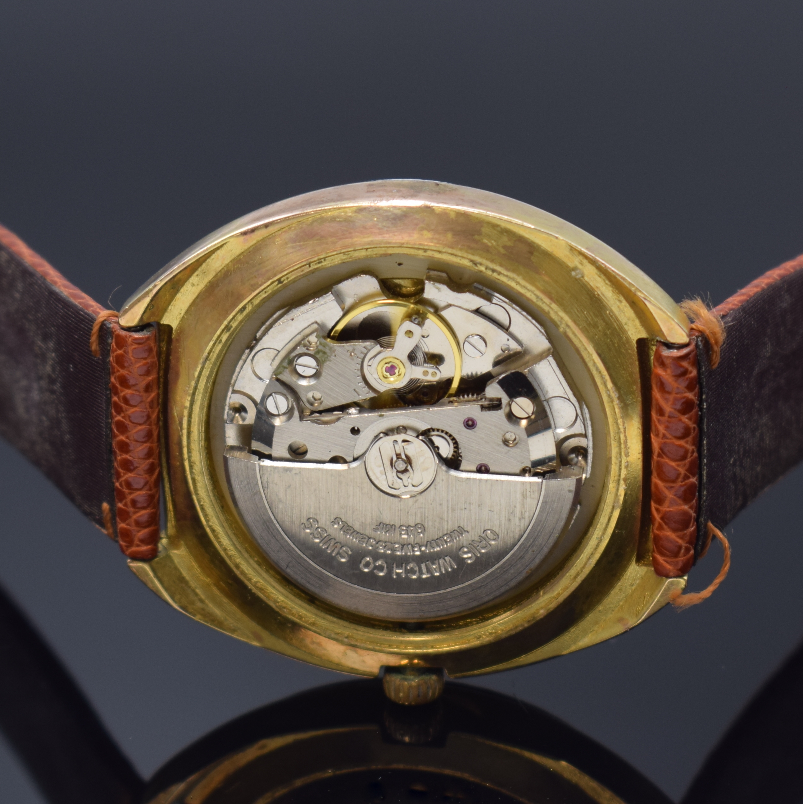 Detail e: ORIS Star vergoldete Herrenarmbanduhr, Schweiz um 1970, Automatik, Stahlboden verschr., gold. Zifferbl. m. gold. Std.-Ind., gold. Leuchtzeiger, Datum ...