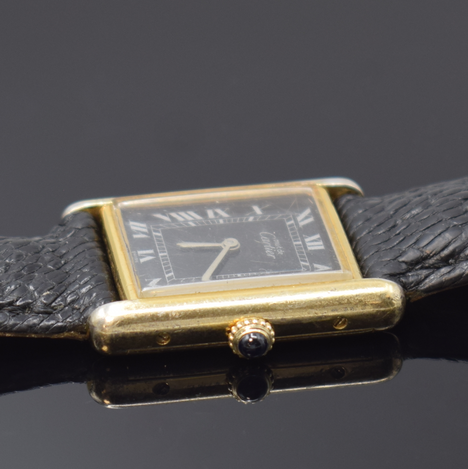 Detail b: CARTIER Tank Damenarmbanduhr, Schweiz um 1995, Handaufzug, Gehäuse in 925er Silber, seitlich 4-fach verschr., schwarzes Zifferbl. riss., m. röm. ...