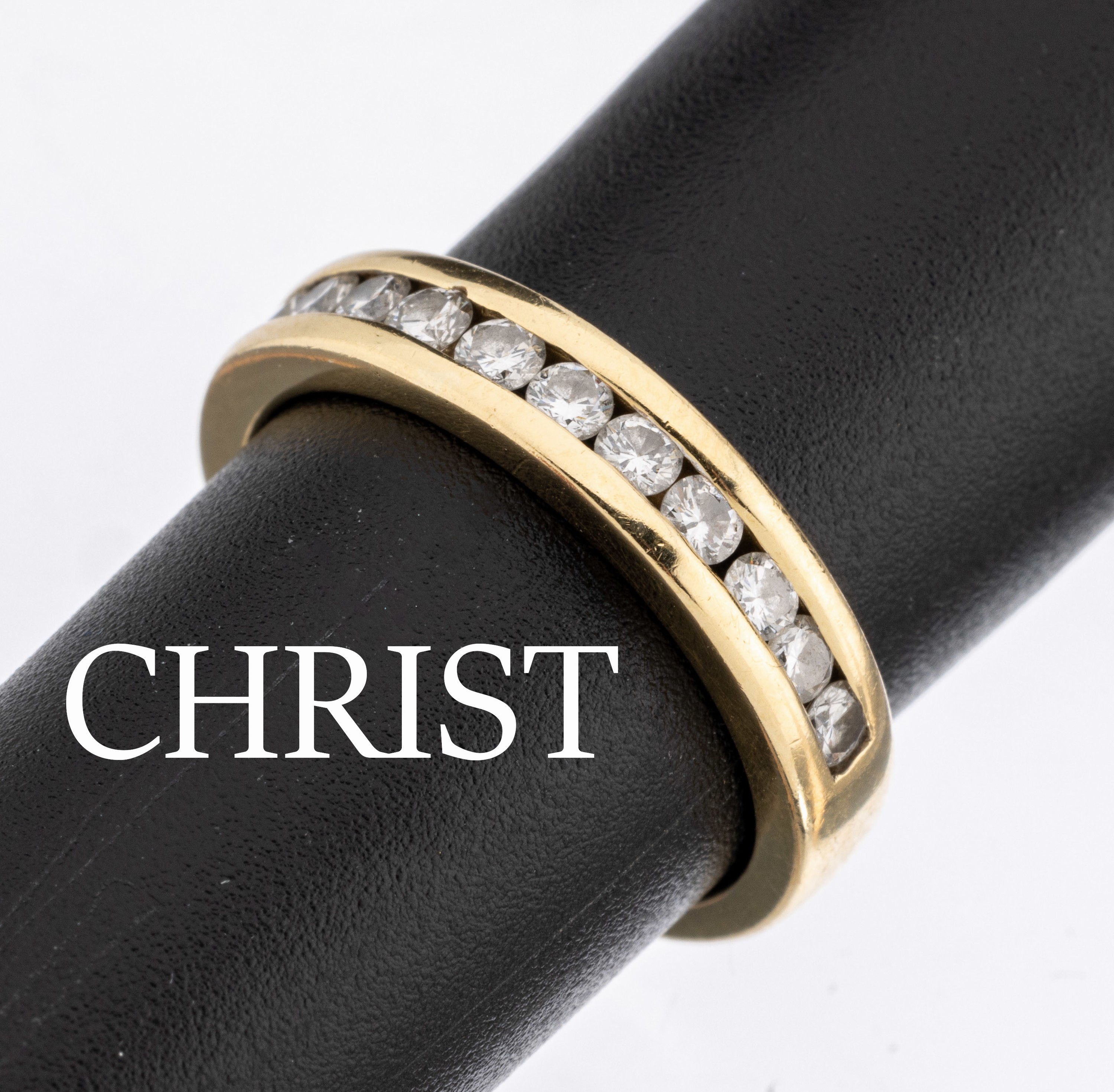 18 kt Gold Brillant-Ring, GG 750/000, 15 Brillanten im Kanal gefasst zus. ca. 0.60 ct Weiß/si, RW 51, ca. 4.7 g, Christ Zertifikat anbei