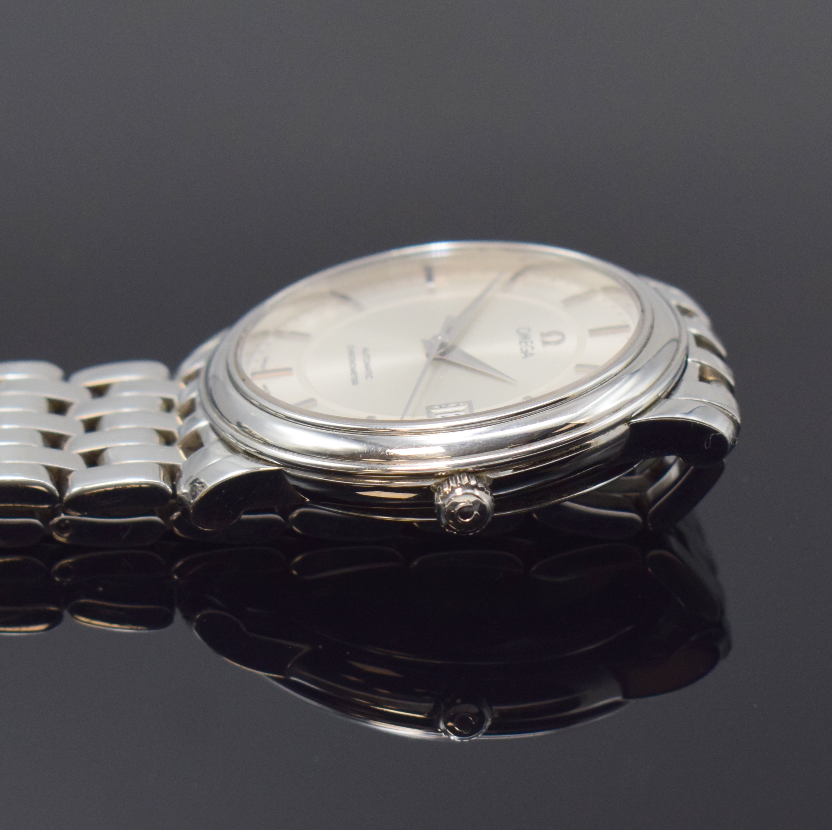 Detail c: OMEGA Armbandchronometer in Edelstahl Referenz 168.1050, Schweiz um 1990, Automatik, orig. Gliederband m. Faltschl., Boden aufgedr., Saphirgl., silb. ...