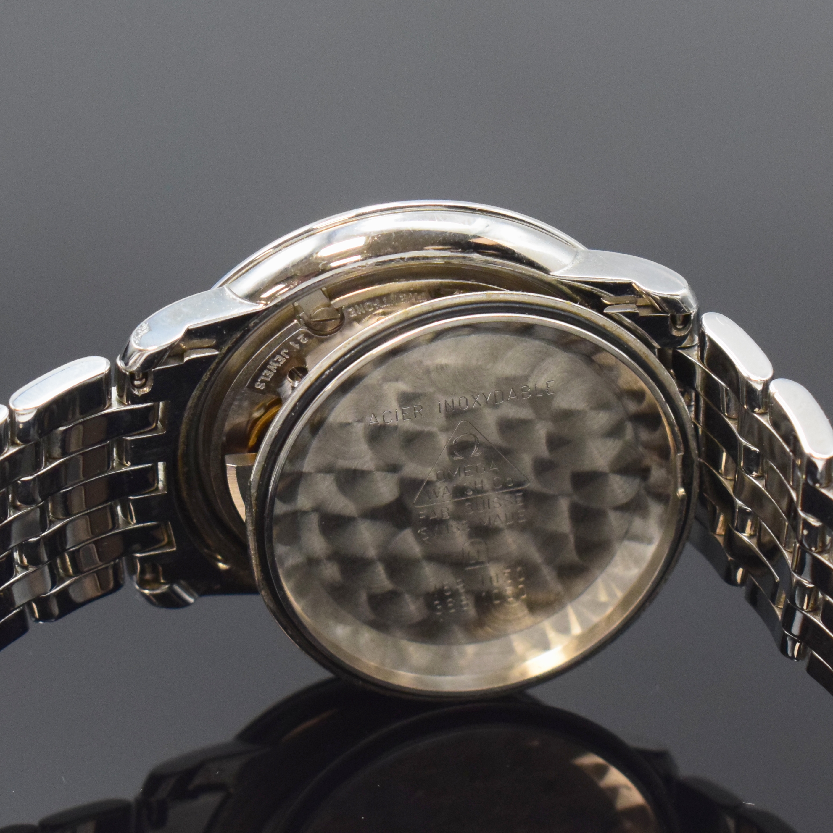Detail g: OMEGA Armbandchronometer in Edelstahl Referenz 168.1050, Schweiz um 1990, Automatik, orig. Gliederband m. Faltschl., Boden aufgedr., Saphirgl., silb. ...